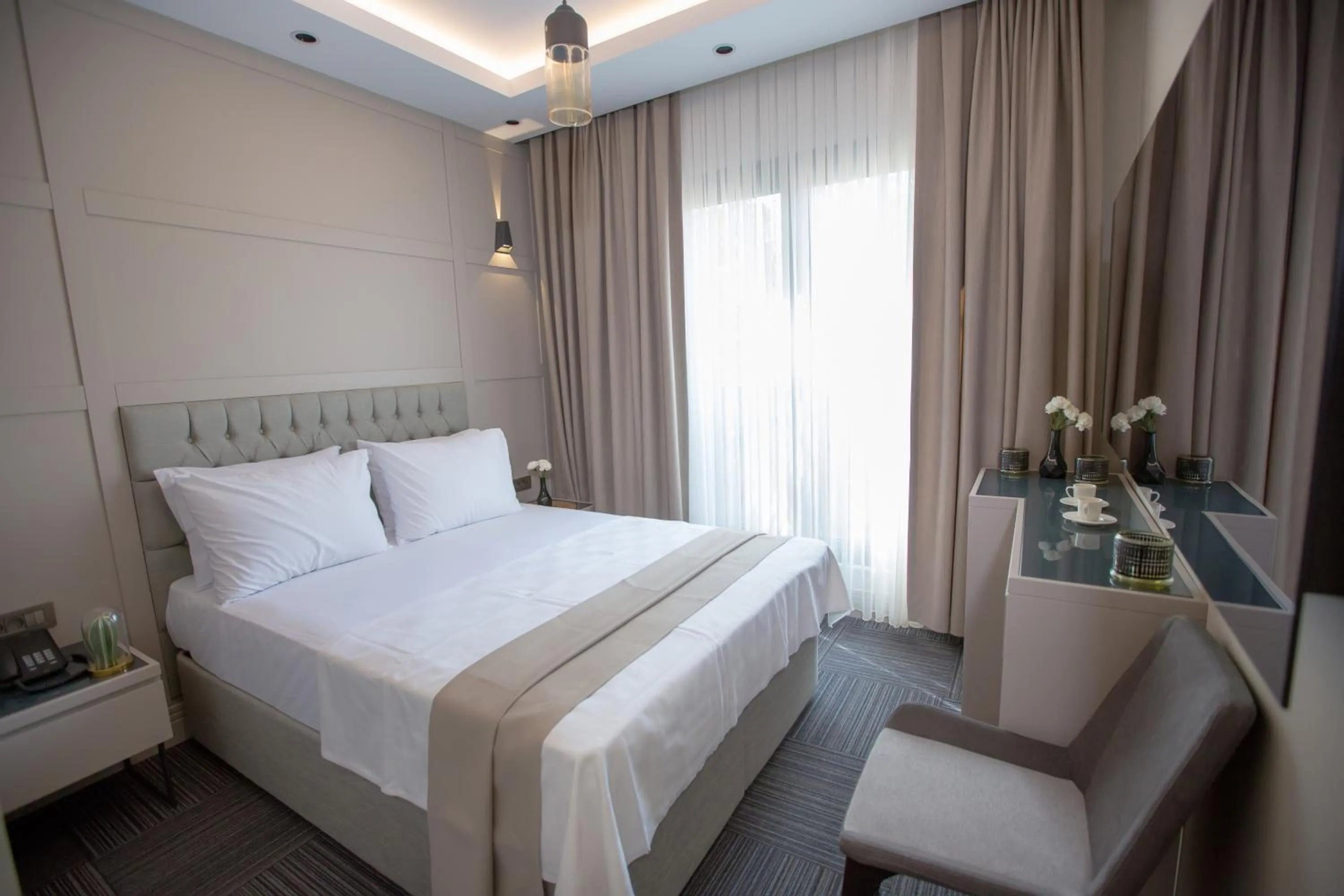 Communal lounge/ TV room, Bed in Anatolia Inn