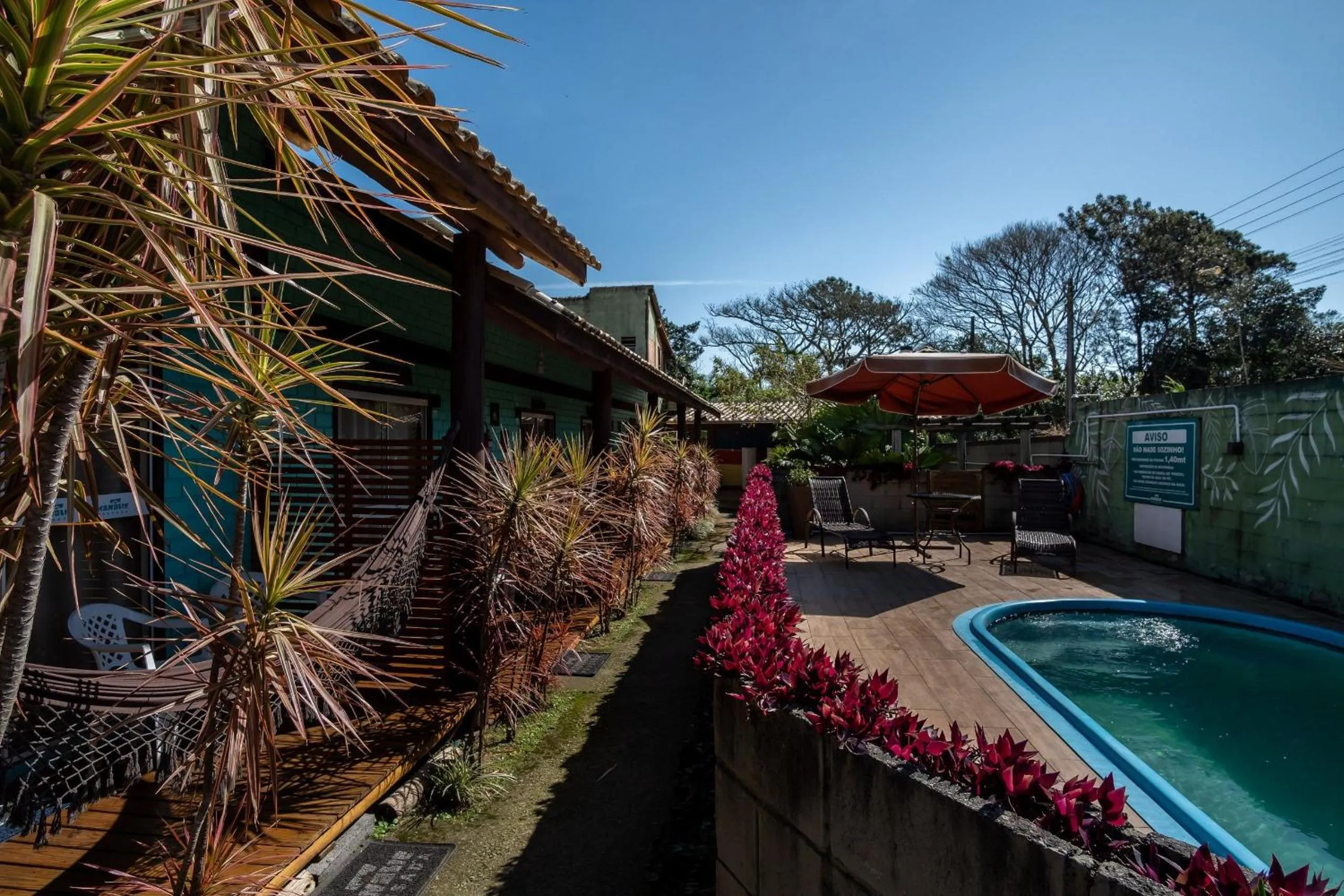 Swimming pool in Pousada Hanalie by - Easy Hotéis