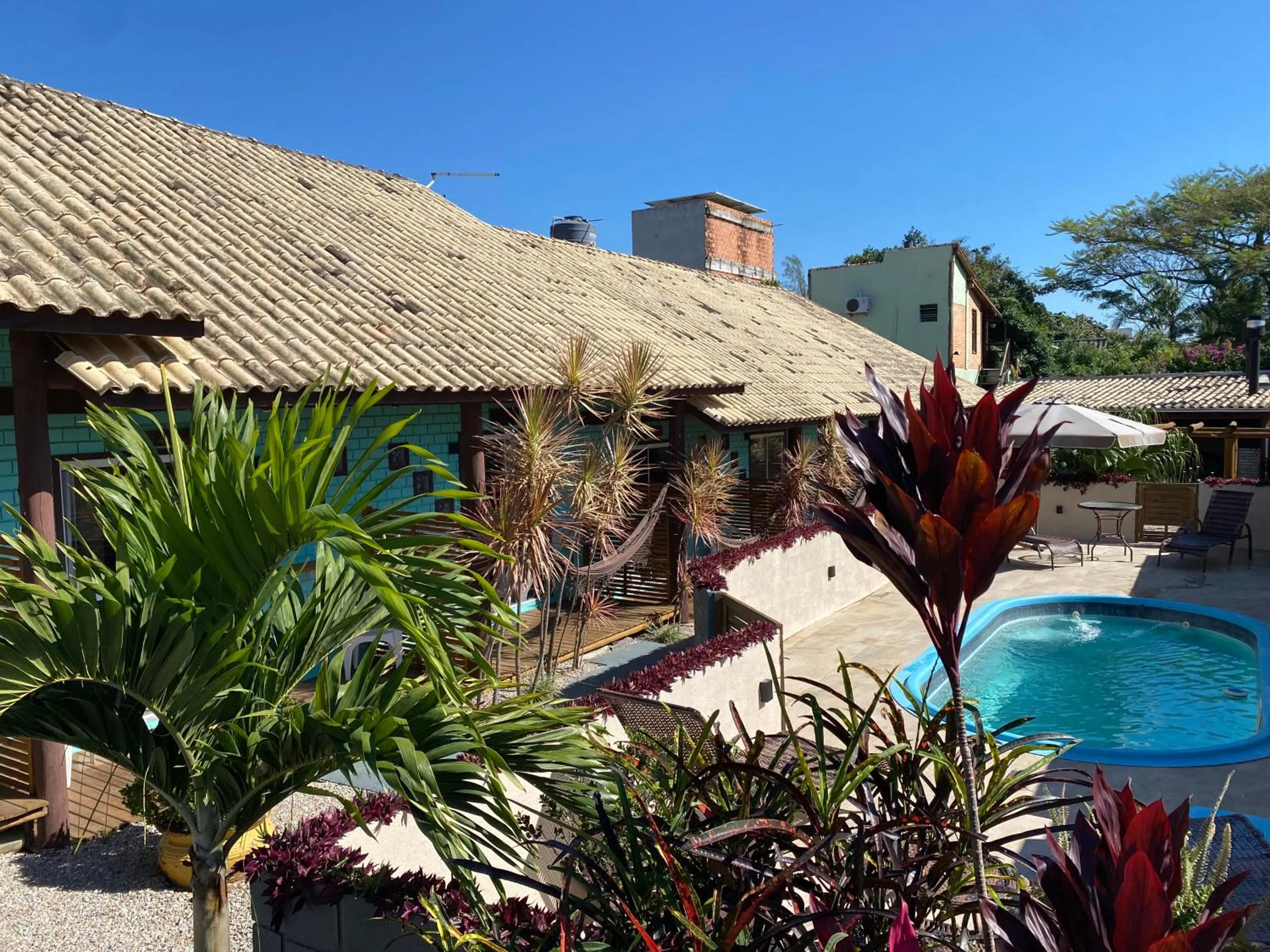 Swimming pool in Pousada Hanalie by - Easy Hotéis