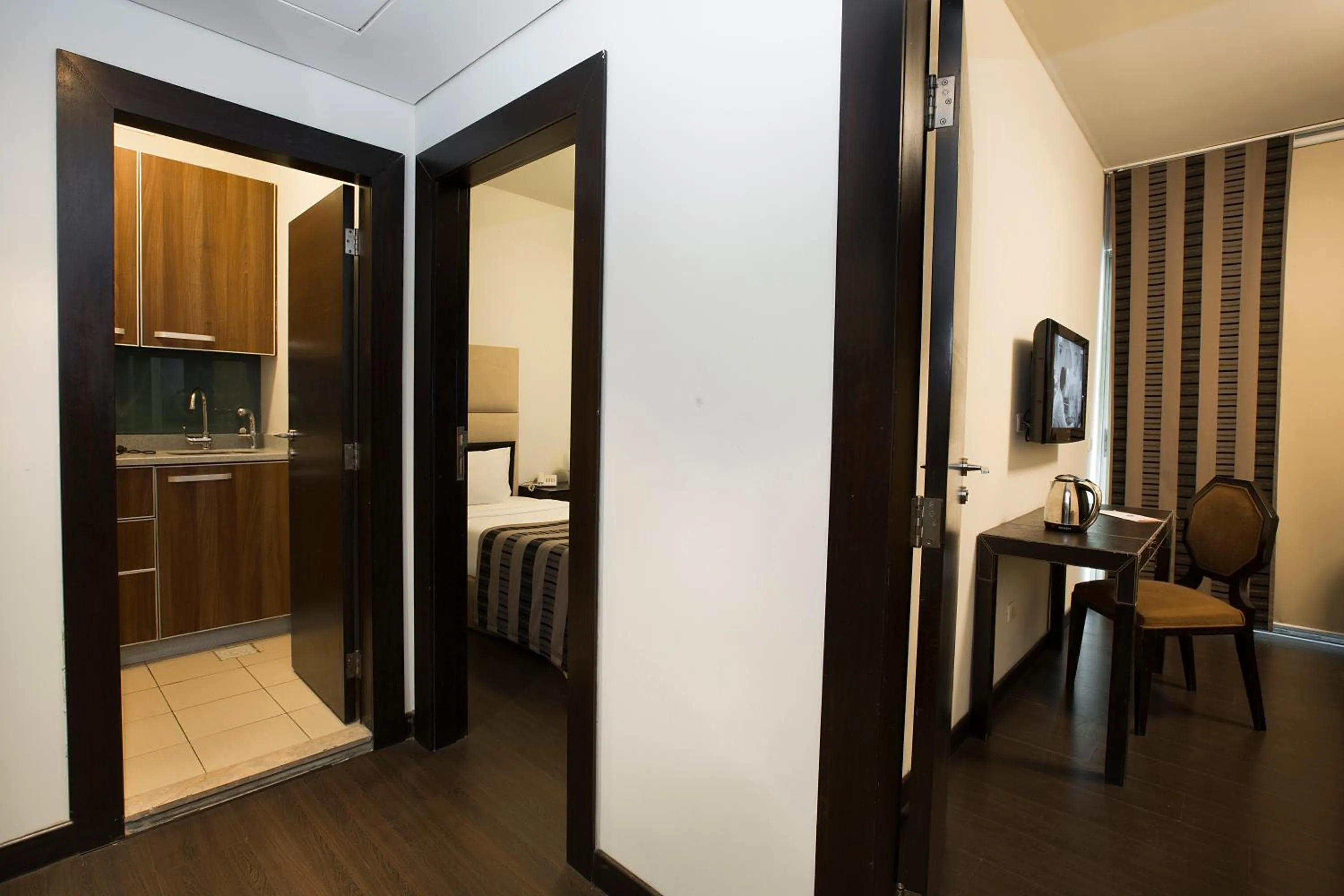 TV and multimedia, Bed in Orient Queen Homes Hotel