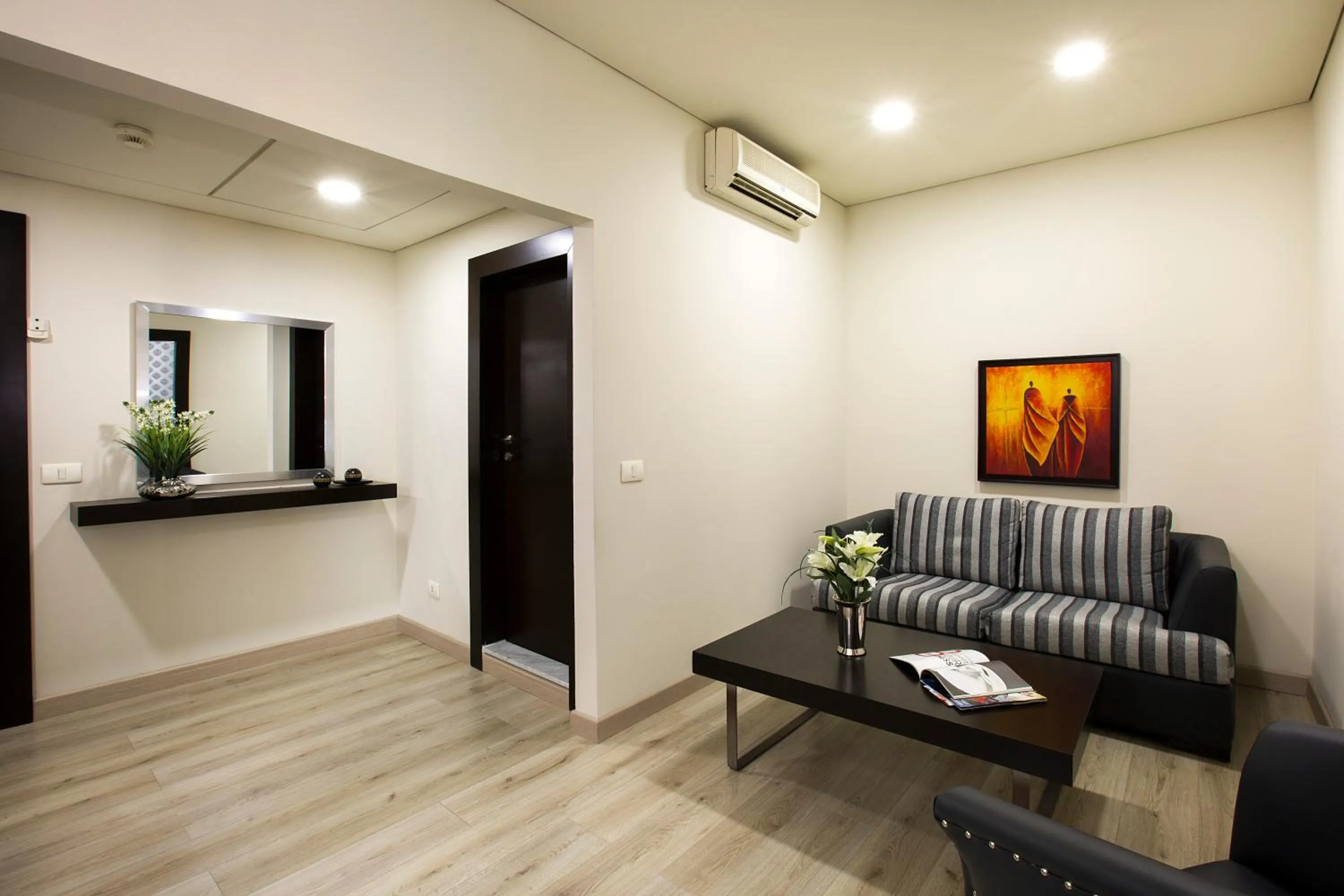 Living room in Orient Queen Homes Hotel