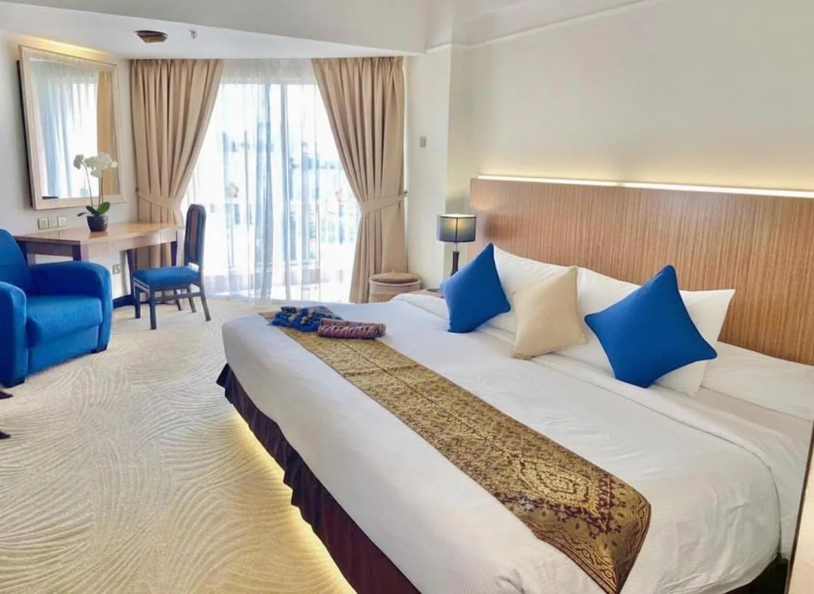 Bed in Primula Beach Hotel