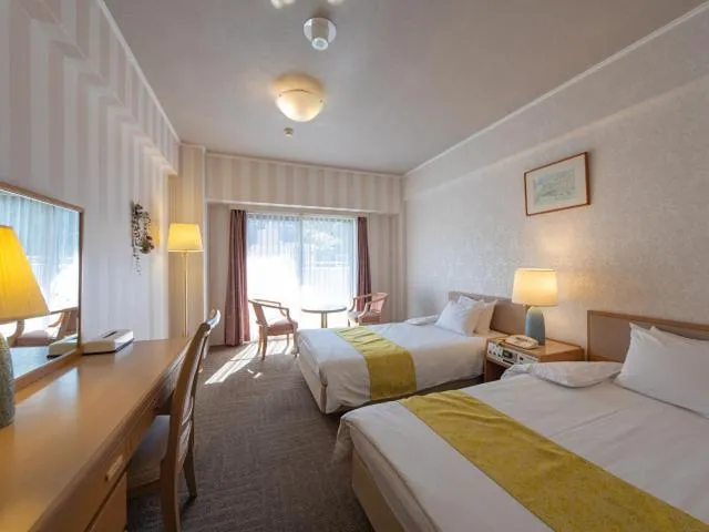 Photo of the whole room, Bed in Merveille Arima