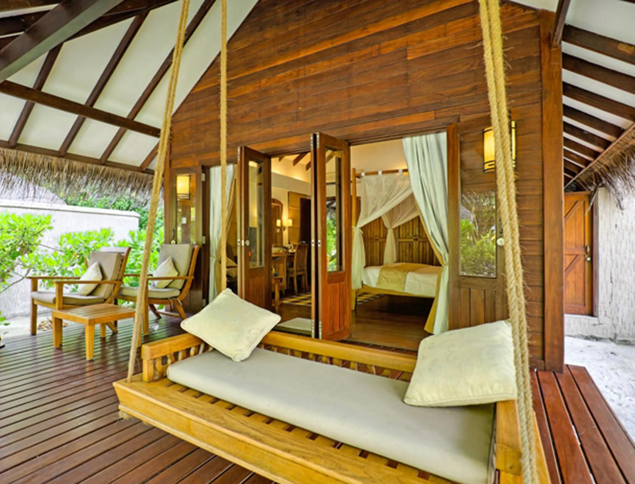 Balcony/Terrace, Bed in Medhufushi Island Resort