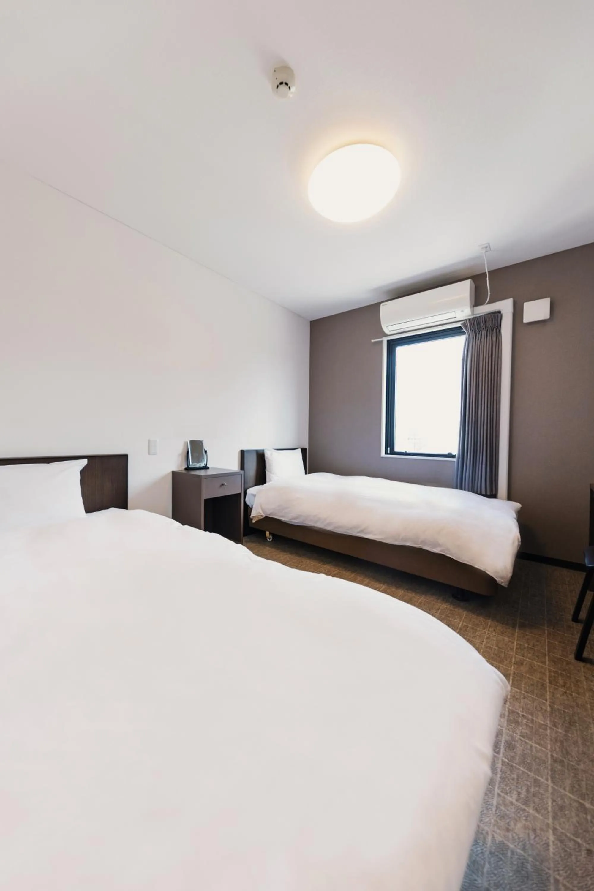 Photo of the whole room, Bed in OKINI HOTEL namba