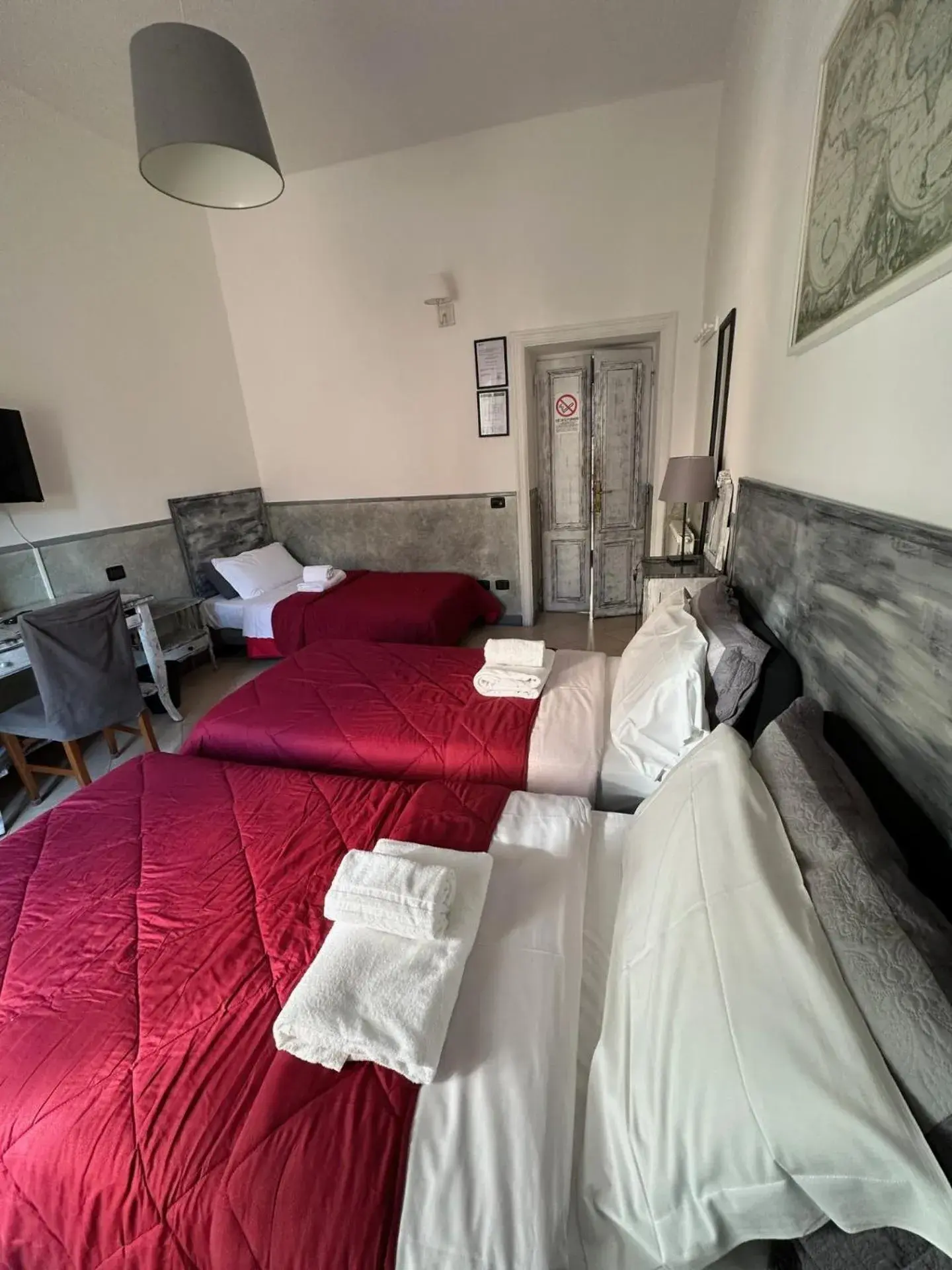 Triple Room with Private External Bathroom - single occupancy in Guest House Relais Indipendenza Triple Room with Private External Bathroom - single occupancy in Guest House Relais Indipendenza