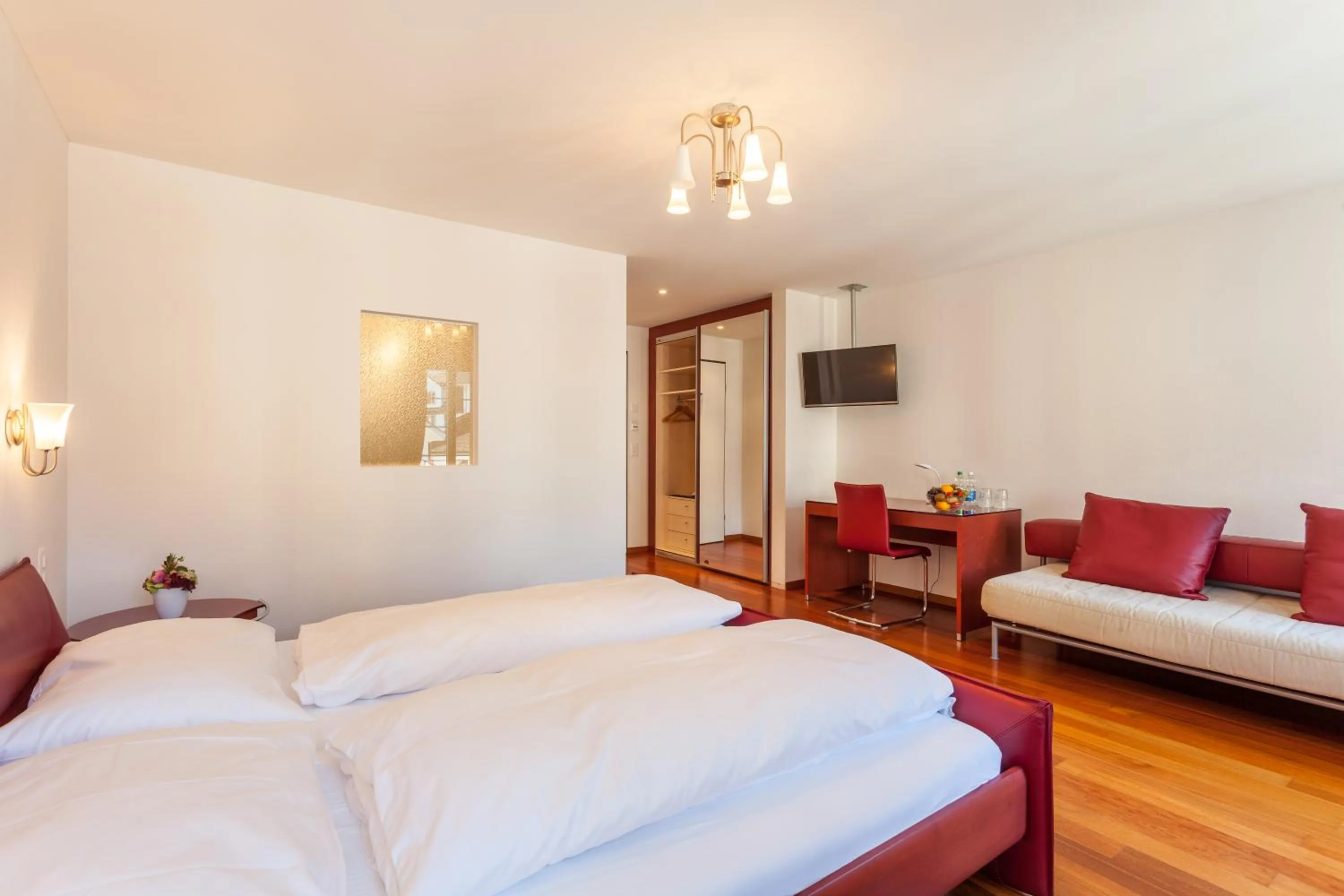 Bed in Weisses Rössli Swiss Quality Hotel