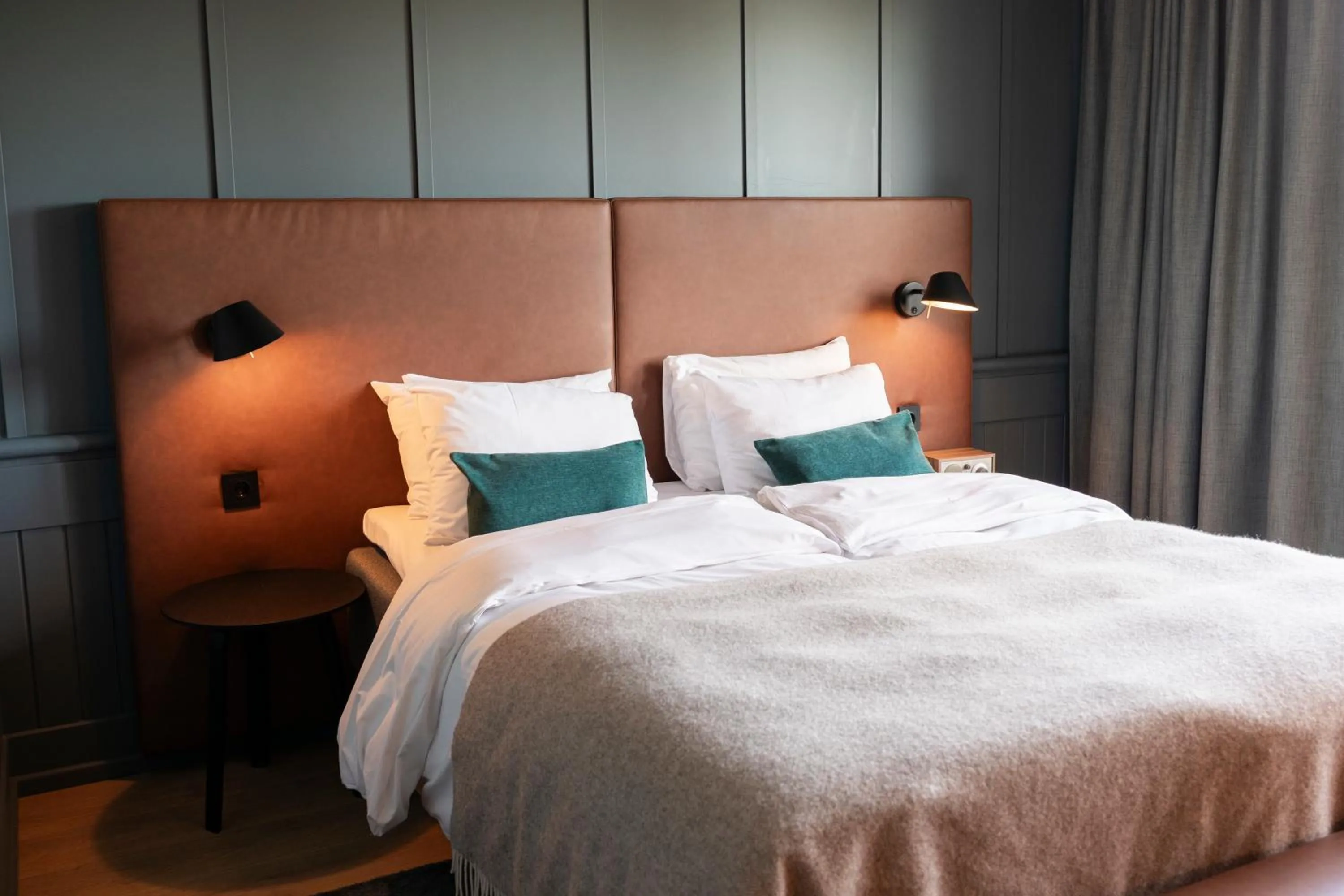 Bed in Home Hotel Tollboden