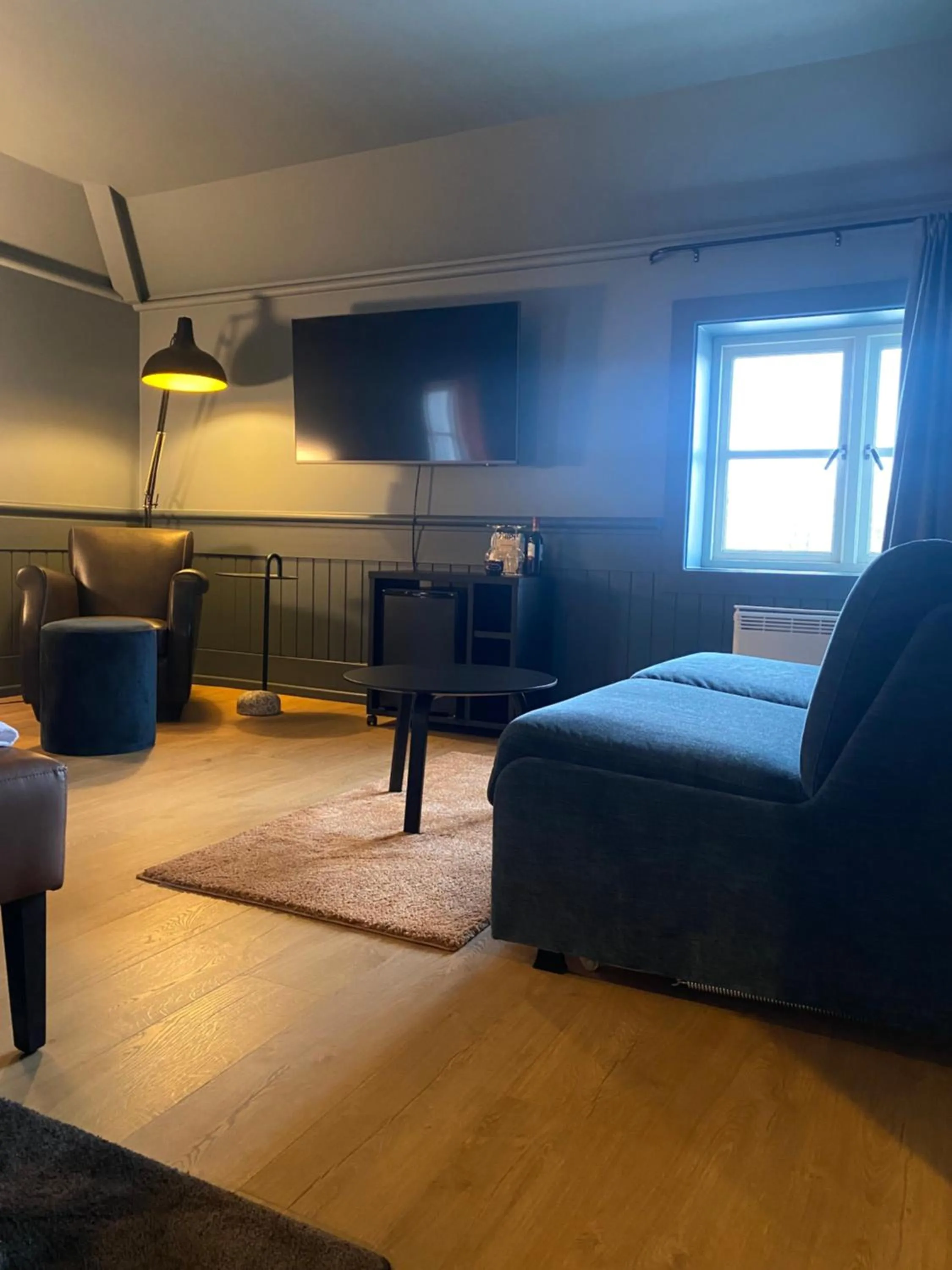 Seating area, Bed in Home Hotel Tollboden