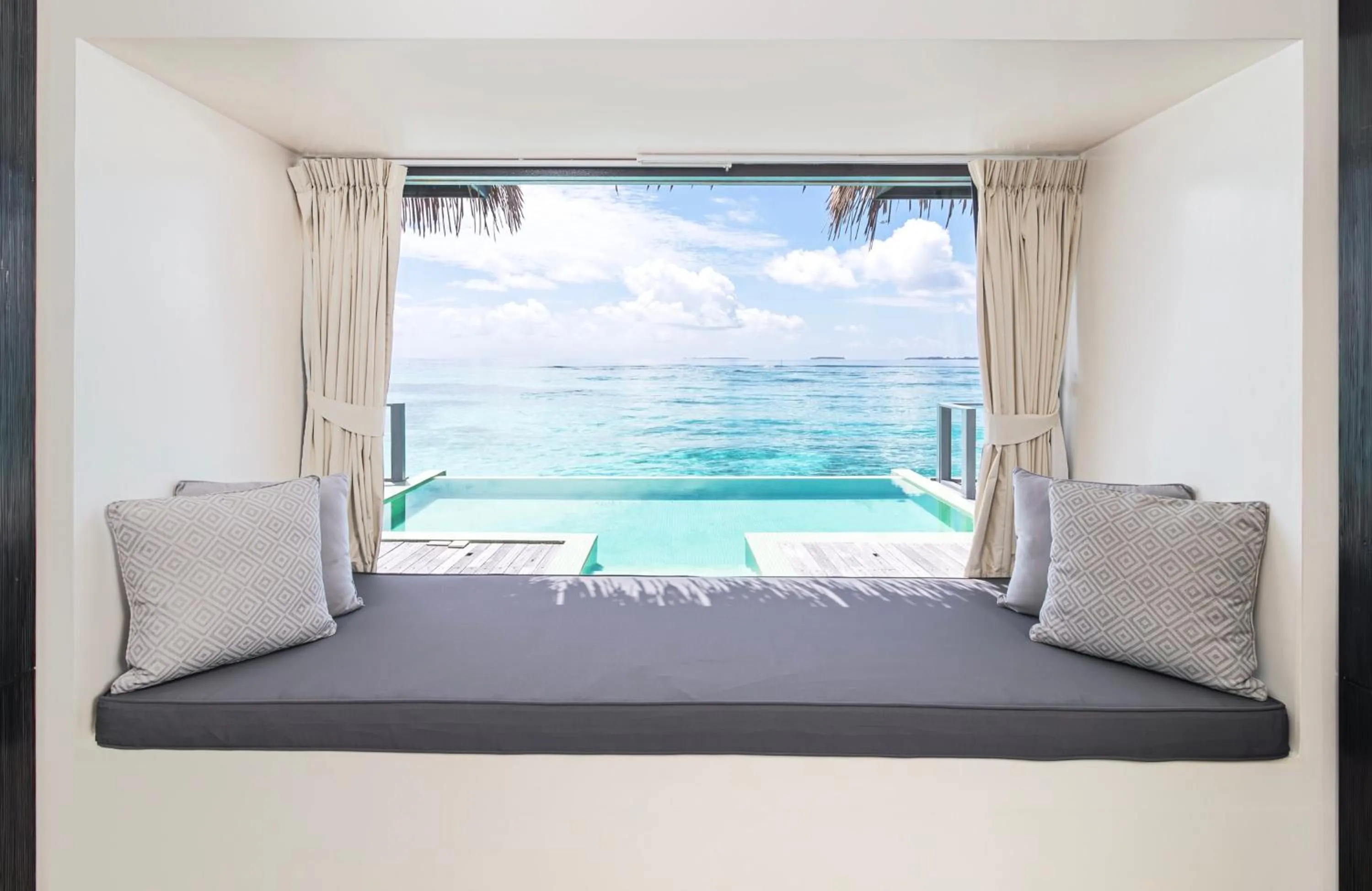 Photo of the whole room, Bed in Noku Maldives, Vignette Collection by IHG