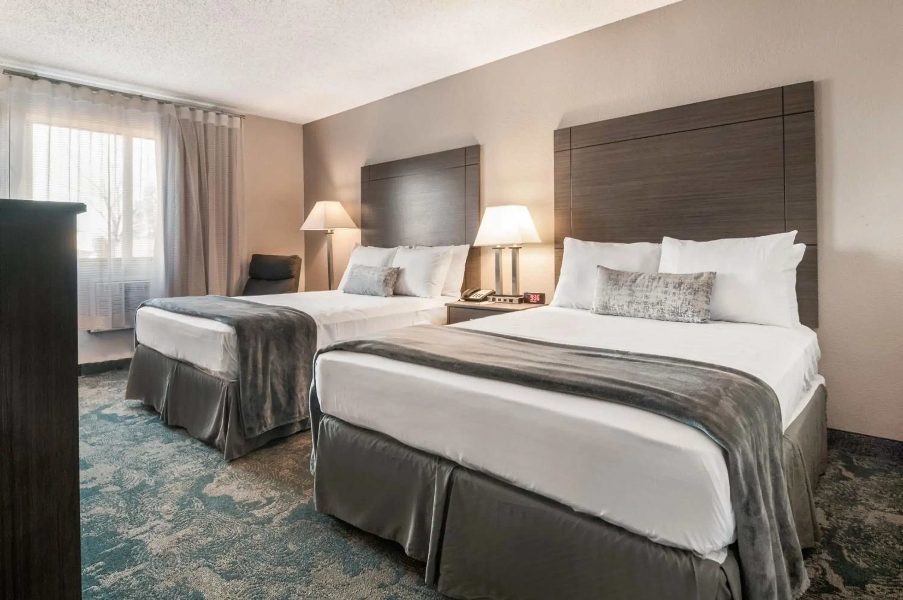 Double Room with Two Double Beds - Non-Smoking in American Inn & Suites Metro Airport Double Room with Two Double Beds - Non-Smoking in American Inn & Suites Metro Airport