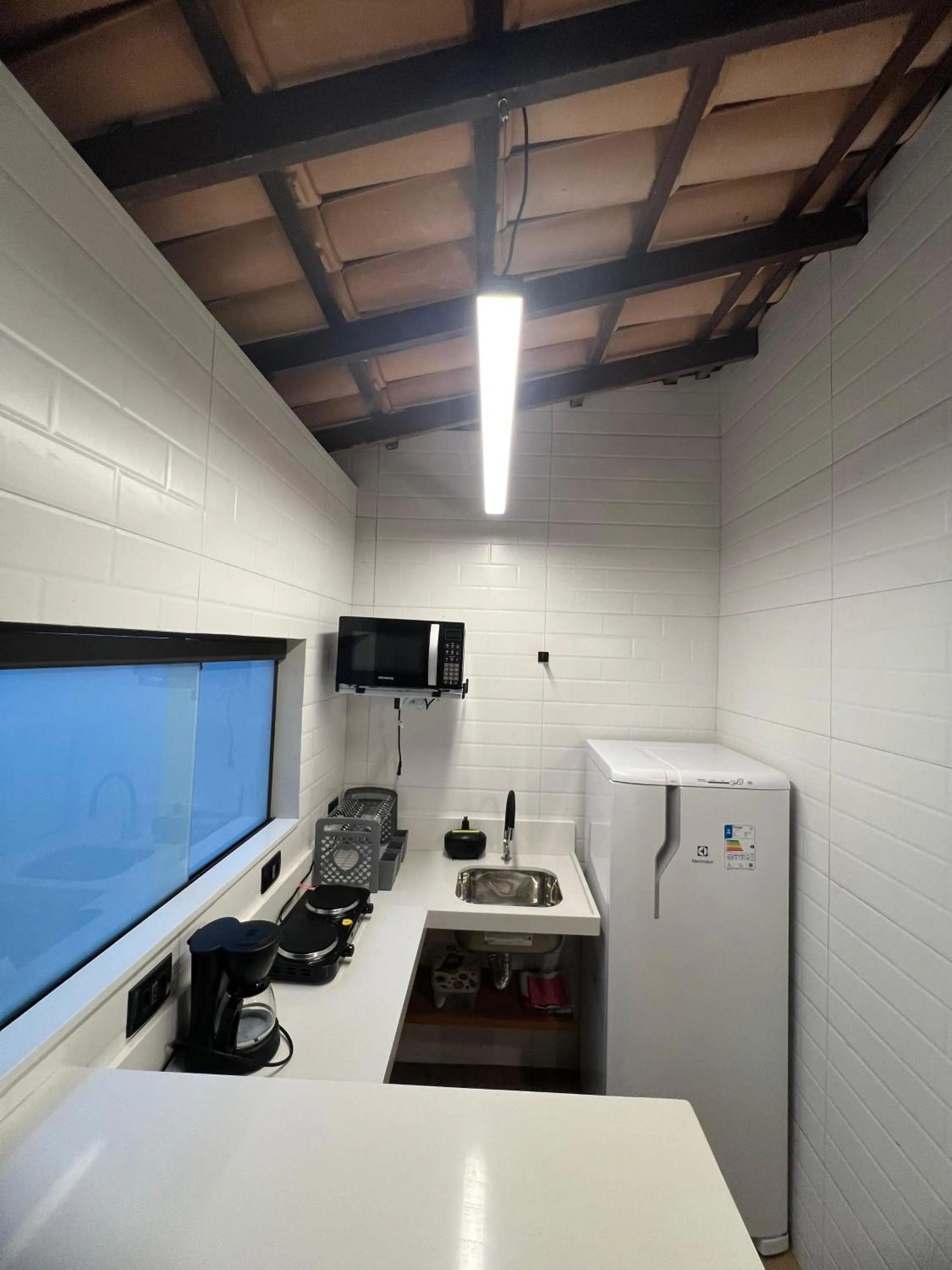 Kitchen or kitchenette in Pousada Praia Bela