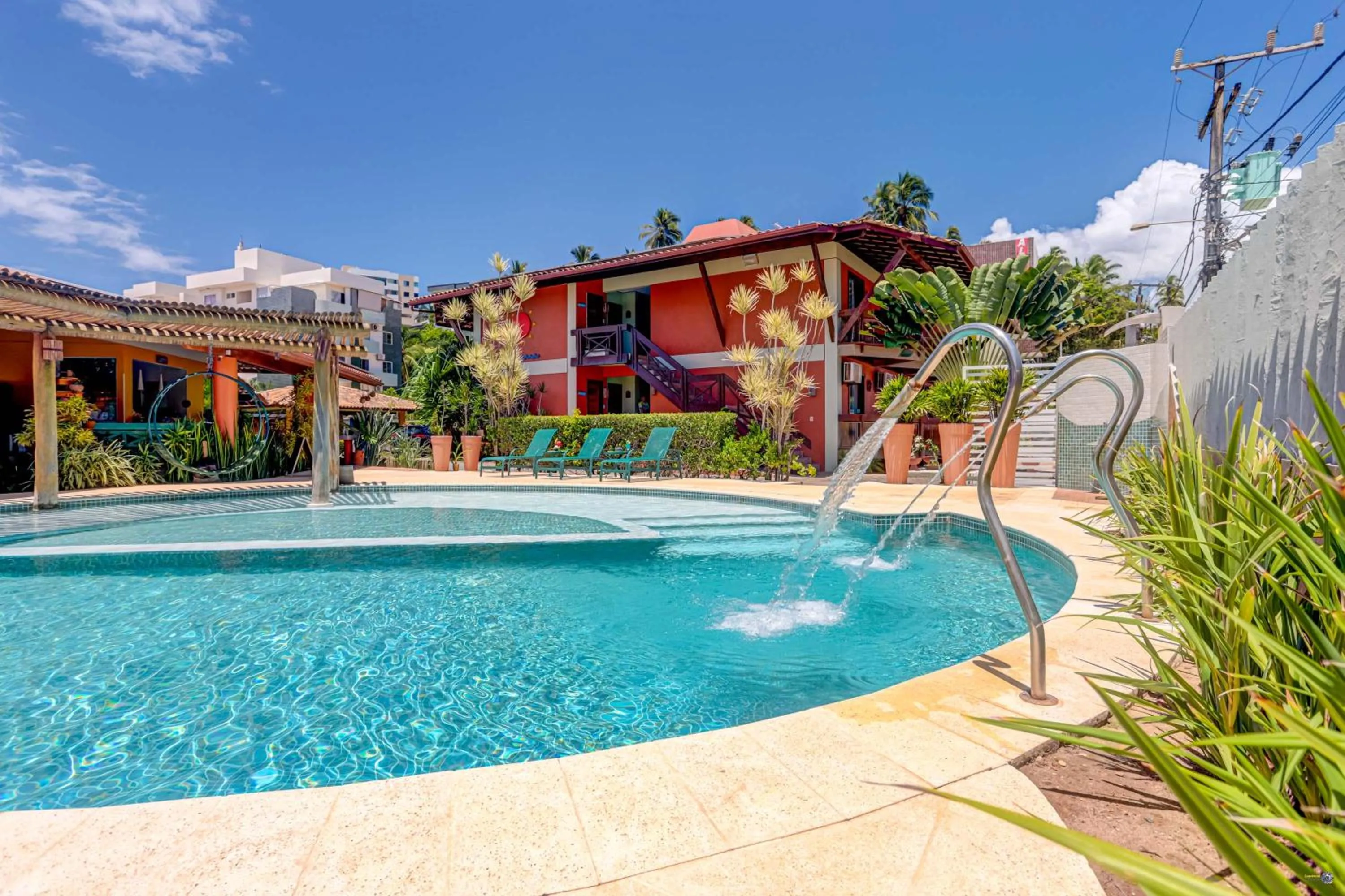 Swimming pool in Pousada Praia Bela