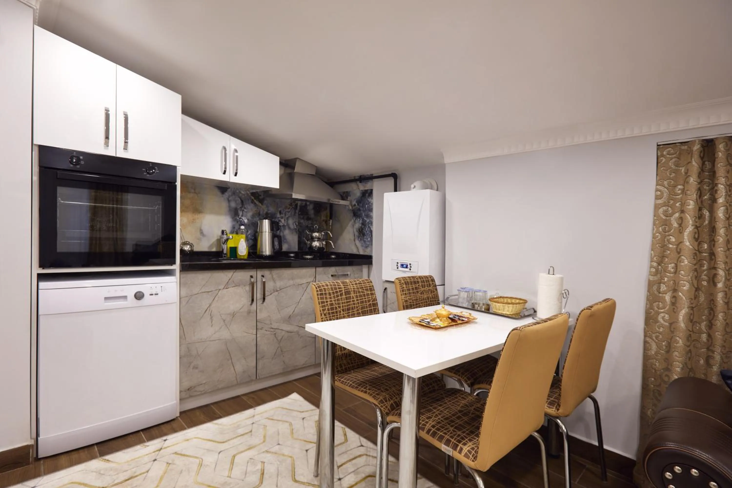 Kitchen or kitchenette in Tarabya Suites