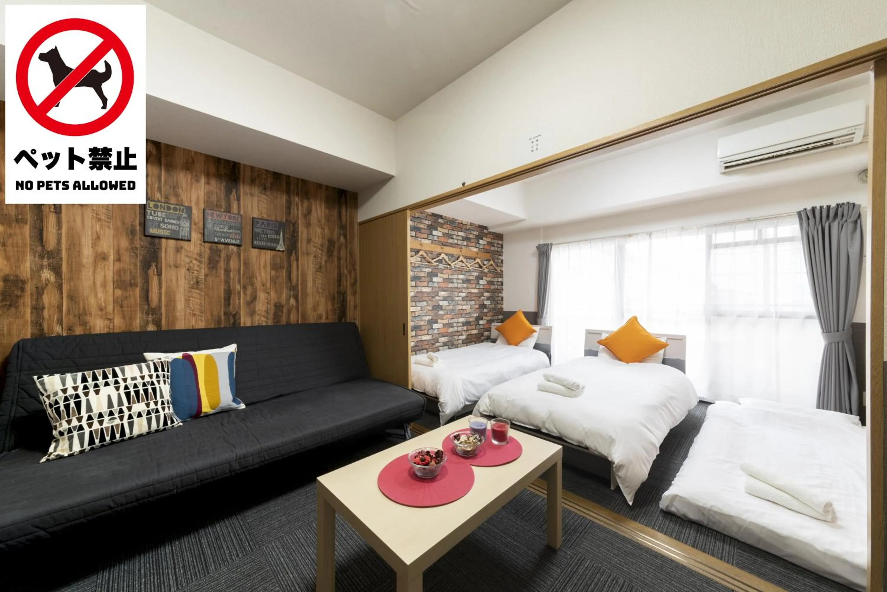 Bed in Grande Famille Shimanouchi Dotonbori Condo