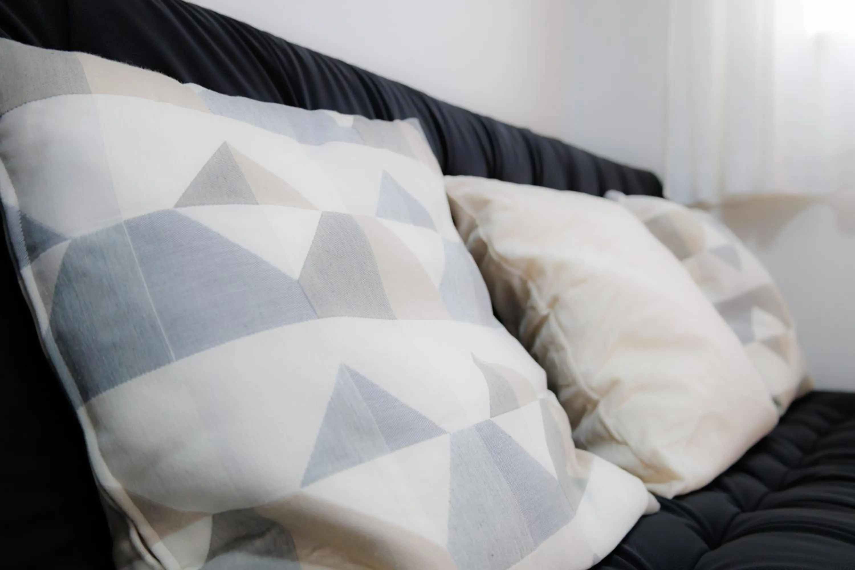 Bed in Grande Famille Shimanouchi Dotonbori Condo