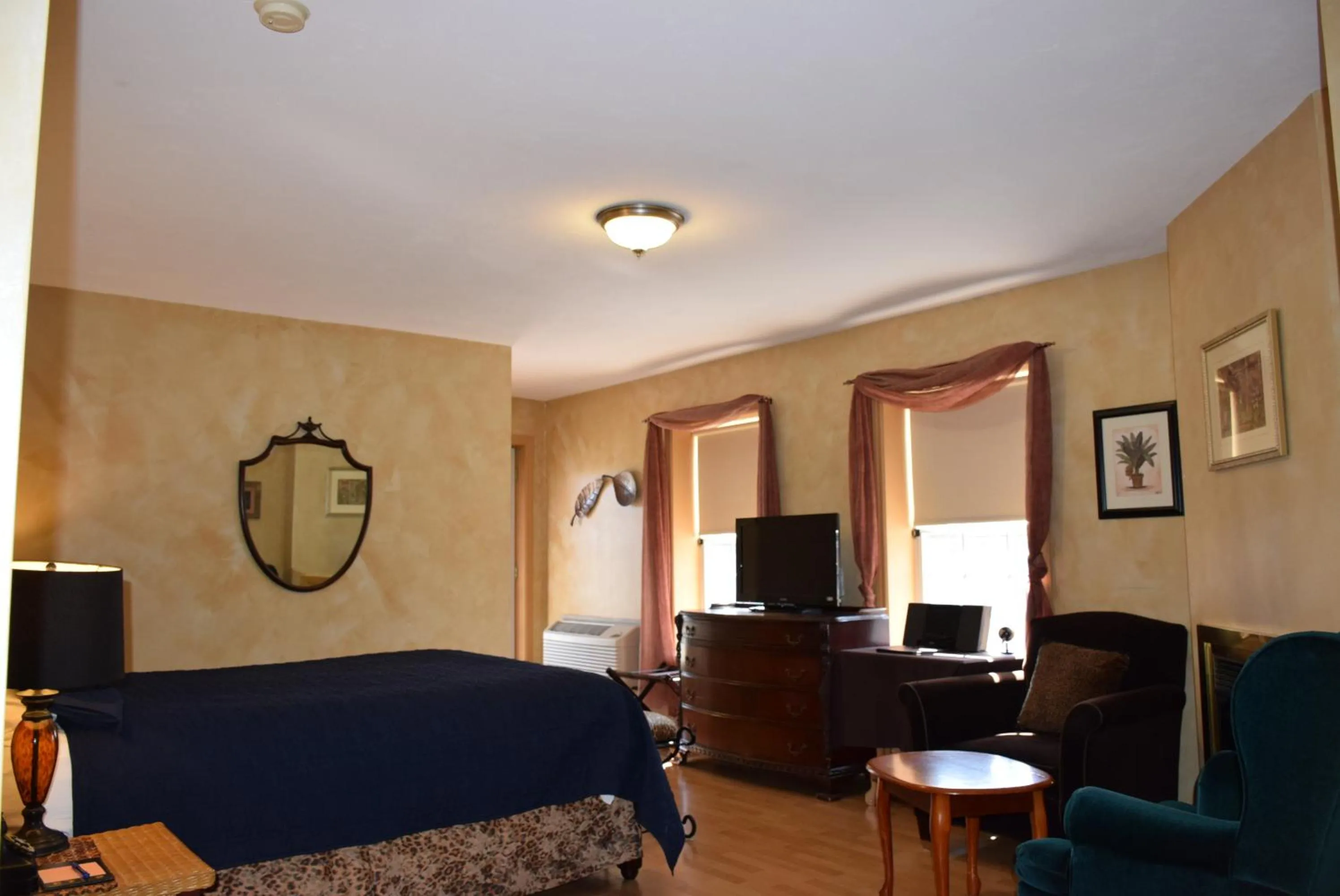 Bedroom in Auberge Wild Rose Inn