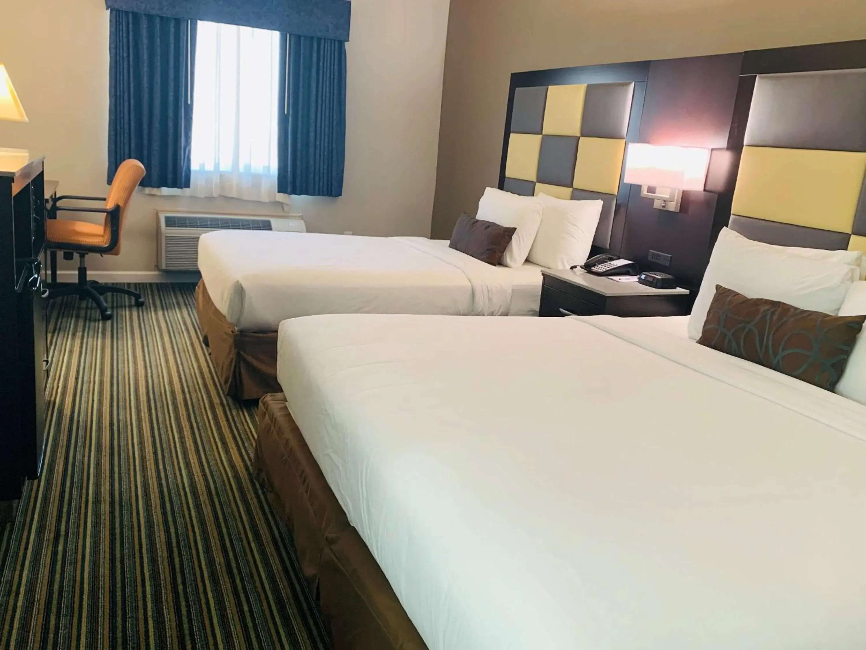 Room with One King and One Double Bed in SureStay Plus Hotel by Best Western Redding Room with One King and One Double Bed in SureStay Plus Hotel by Best Western Redding