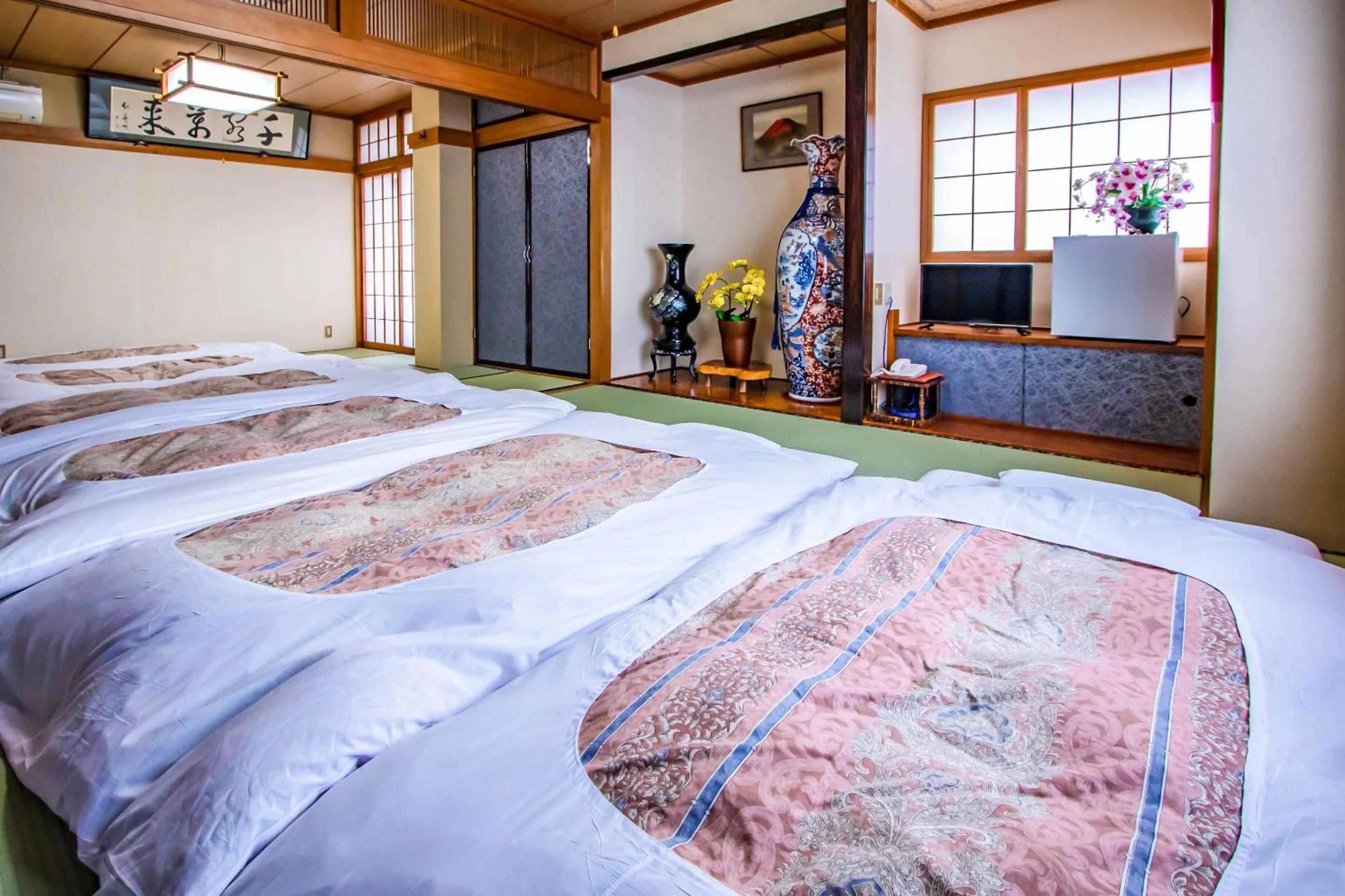 Communal lounge/ TV room, Bed in Tabist ホテル富士