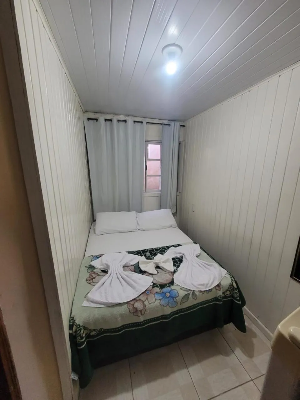 Bed in Pousada Miniférico