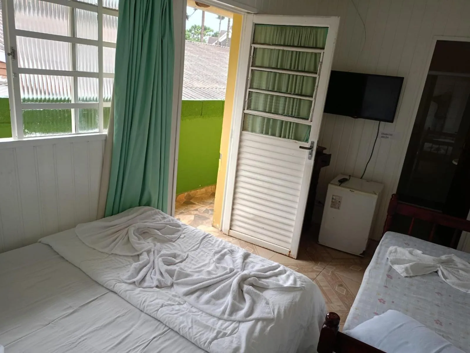 Bed in Pousada Miniférico