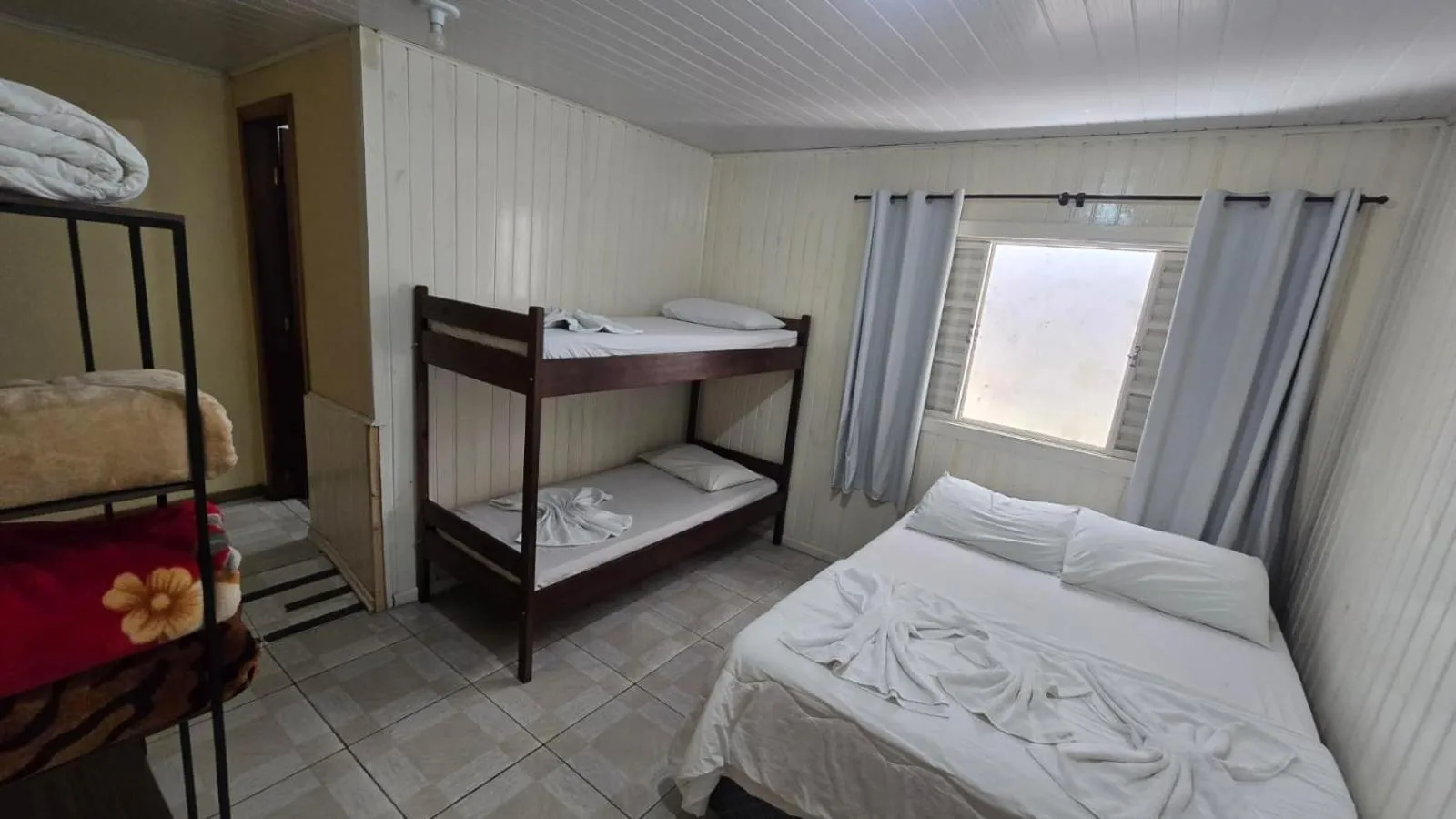 Bed in Pousada Miniférico