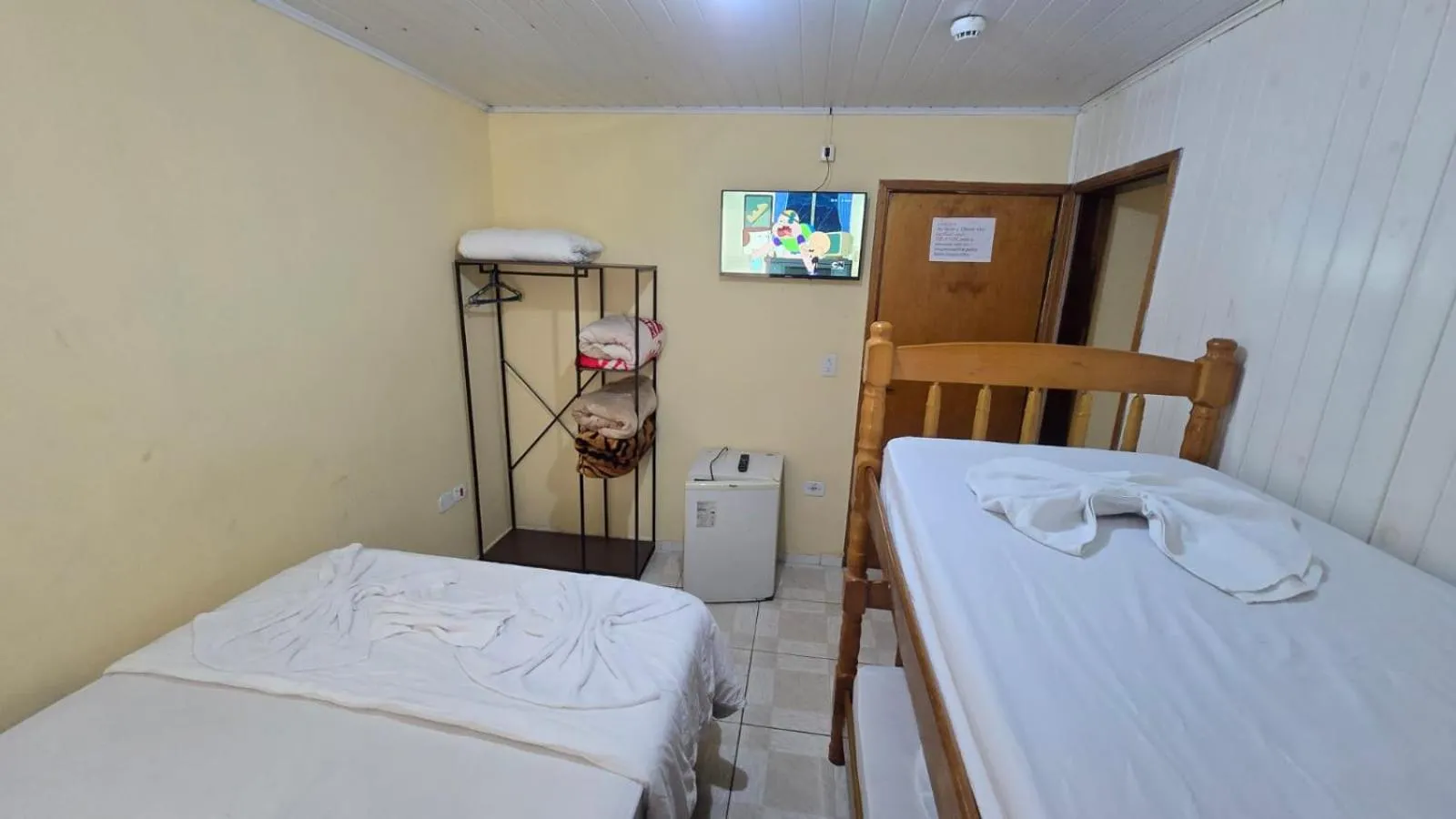 Bed in Pousada Miniférico