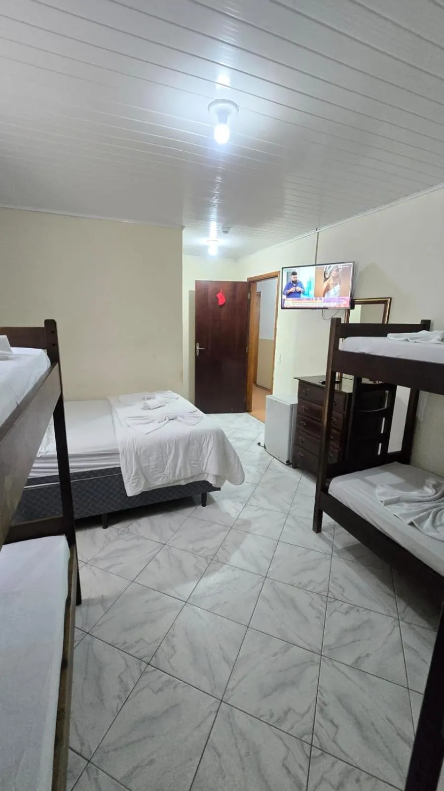 Bed in Pousada Miniférico