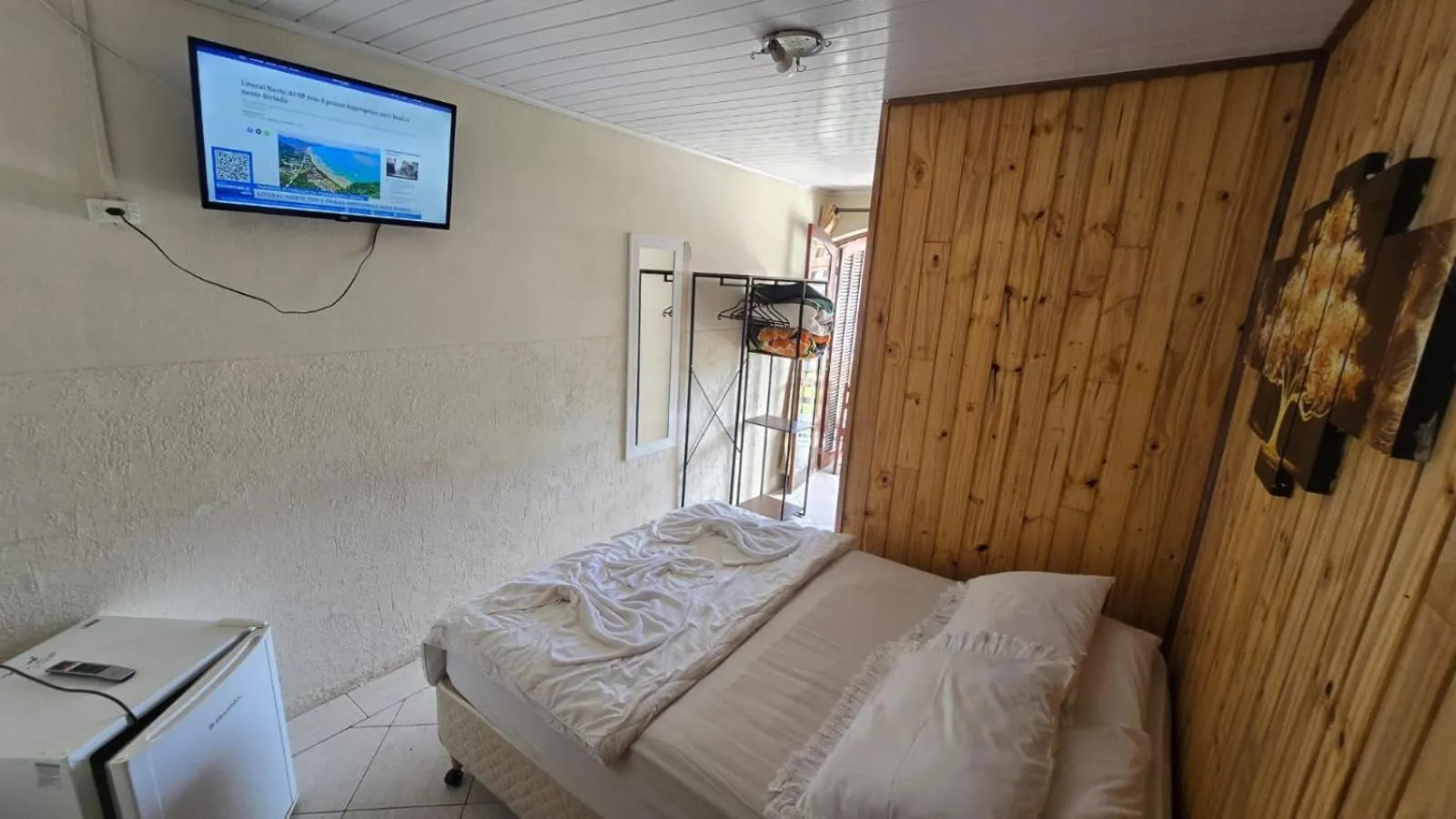 Bed in Pousada Miniférico