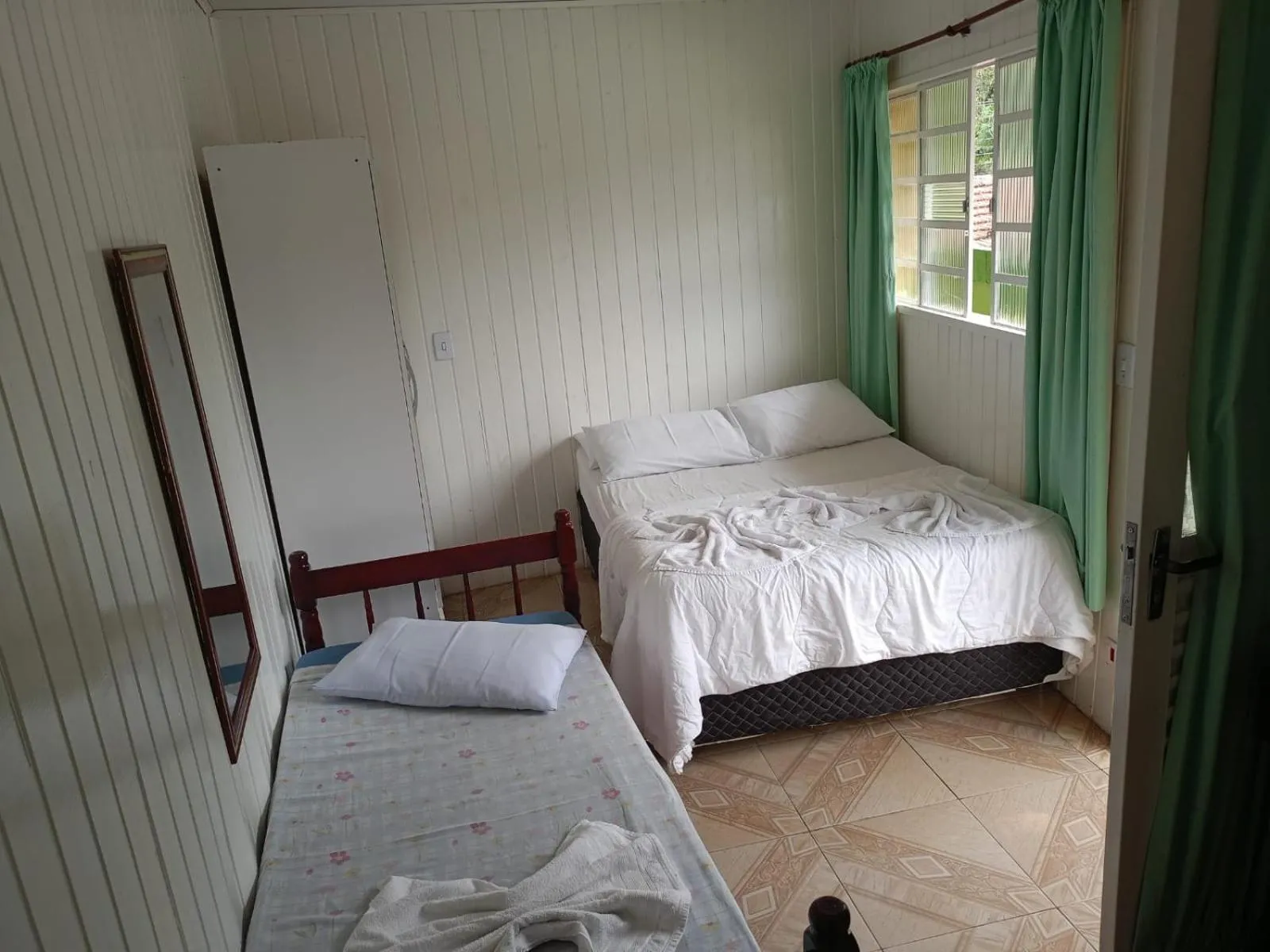Bed in Pousada Miniférico