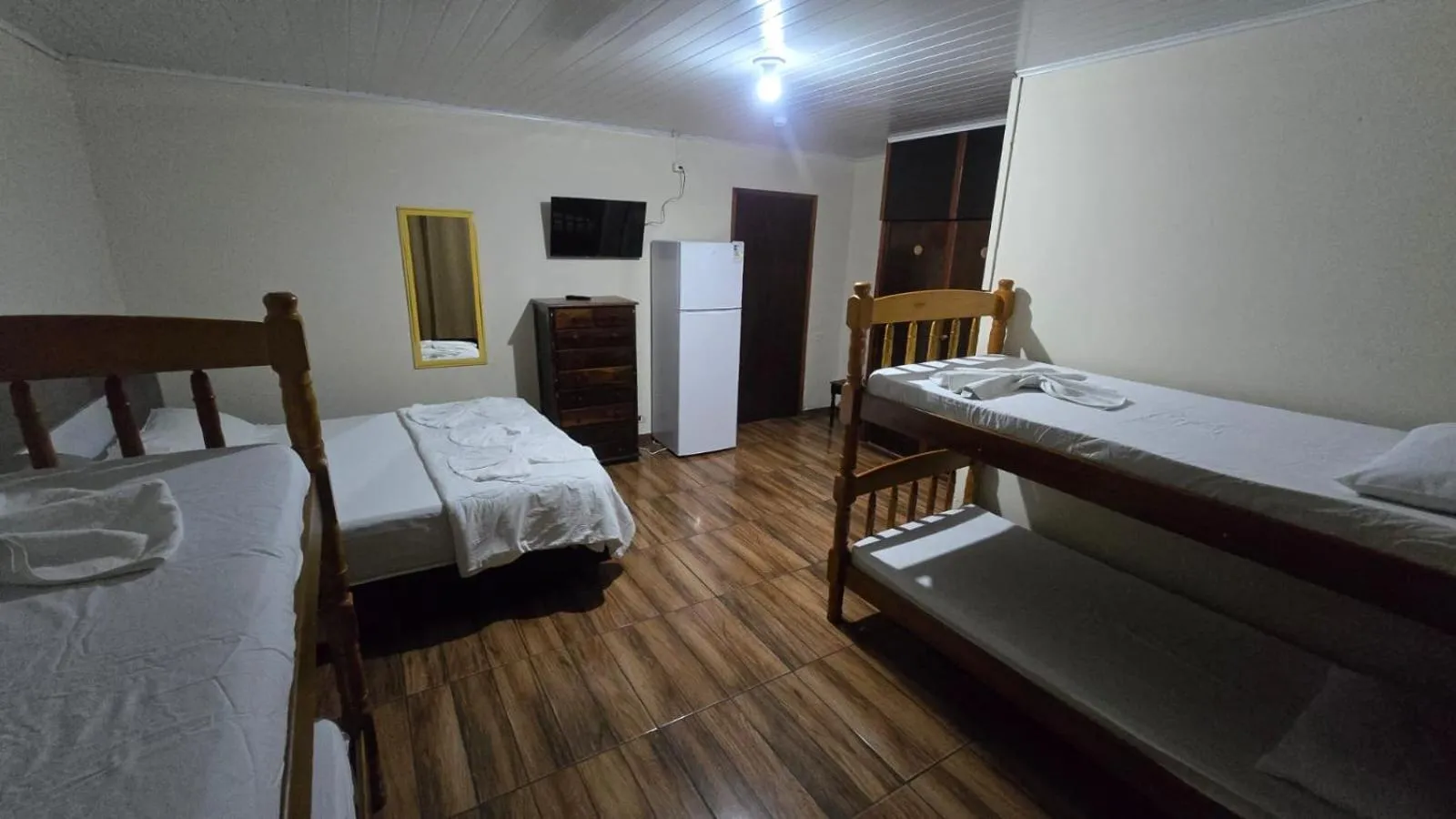 Bed in Pousada Miniférico