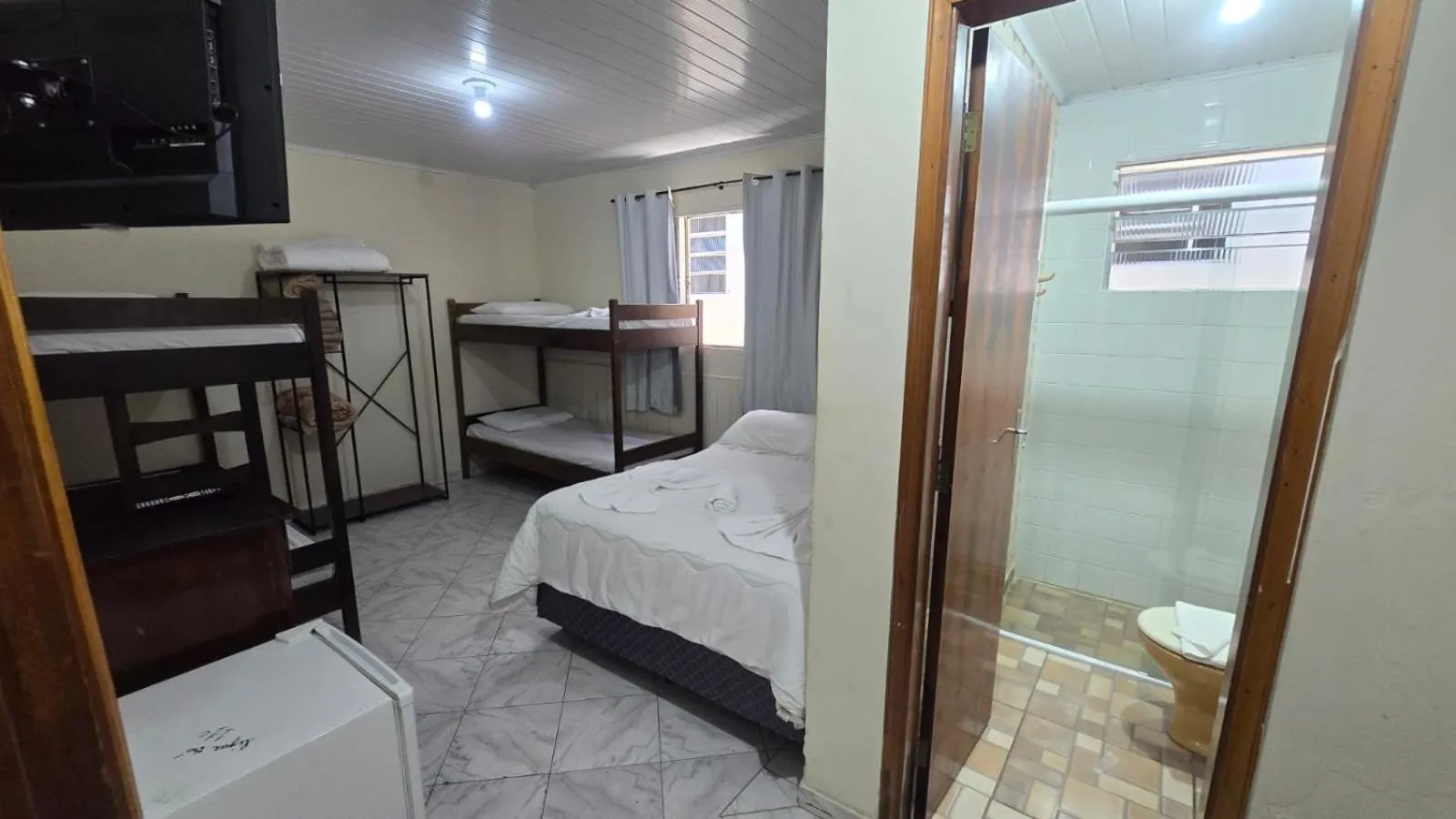 Bed in Pousada Miniférico