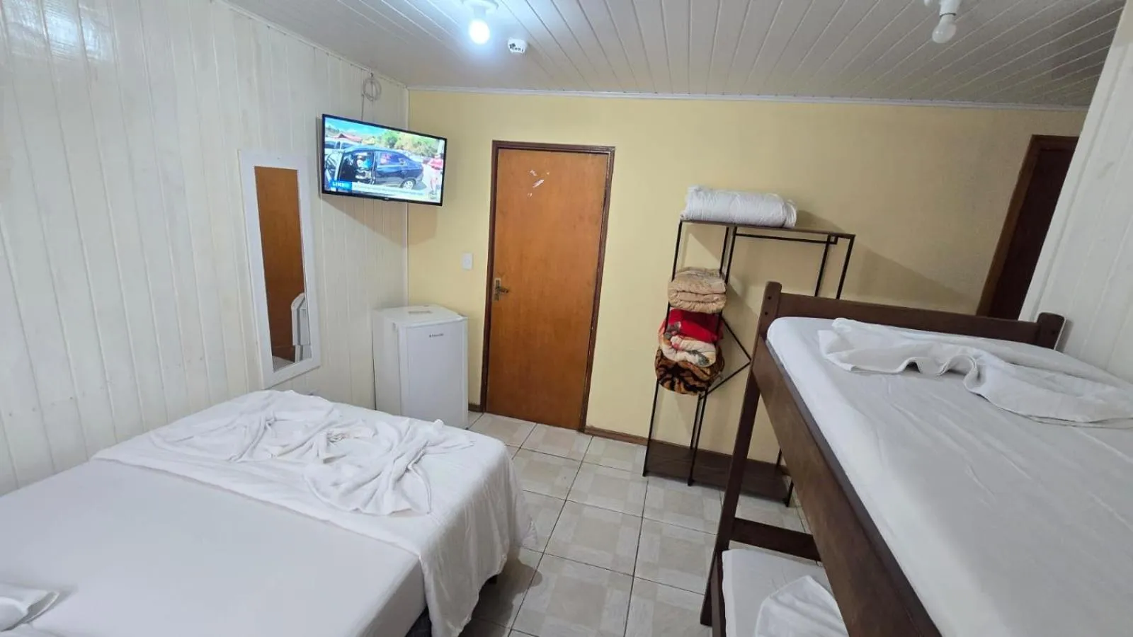 Bed in Pousada Miniférico