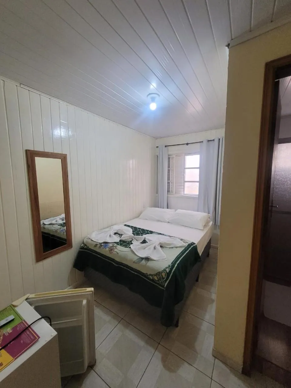 Bed in Pousada Miniférico