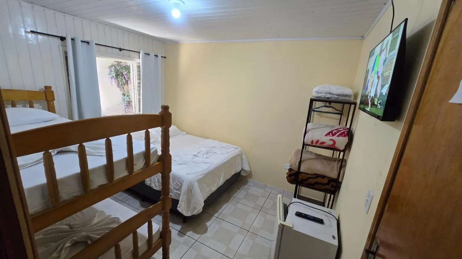 Bed in Pousada Miniférico