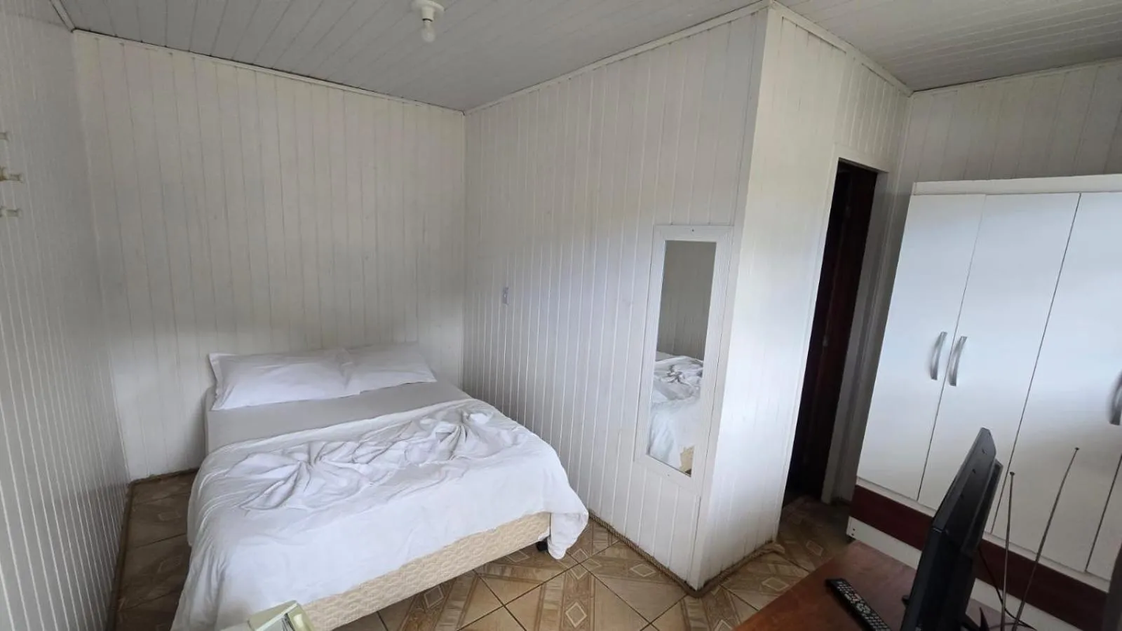 Bed in Pousada Miniférico