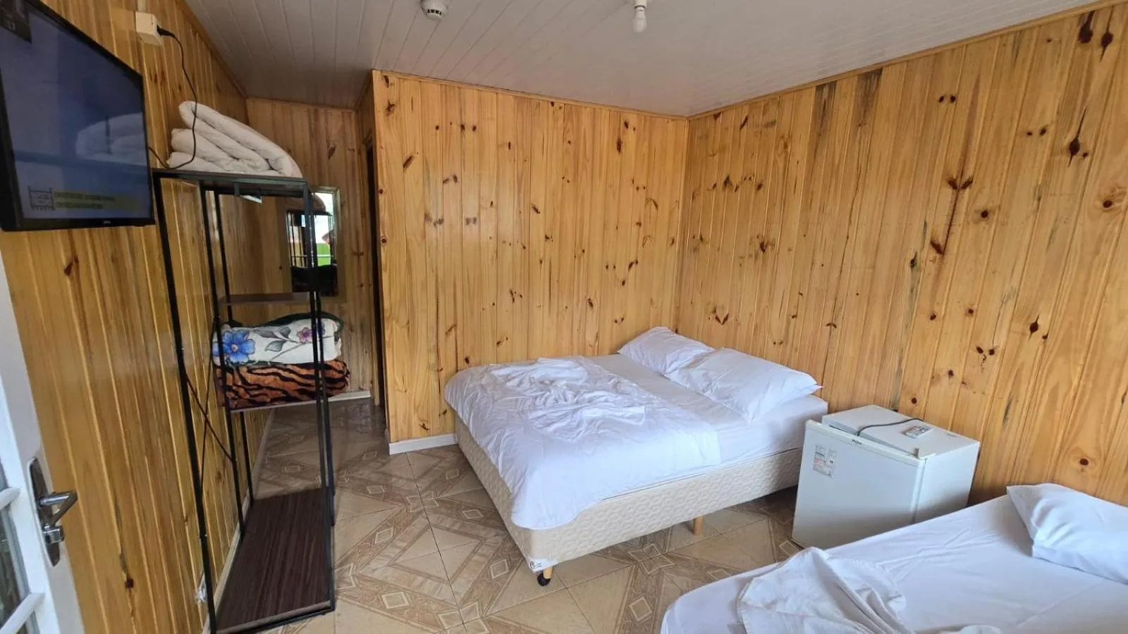 Bed in Pousada Miniférico