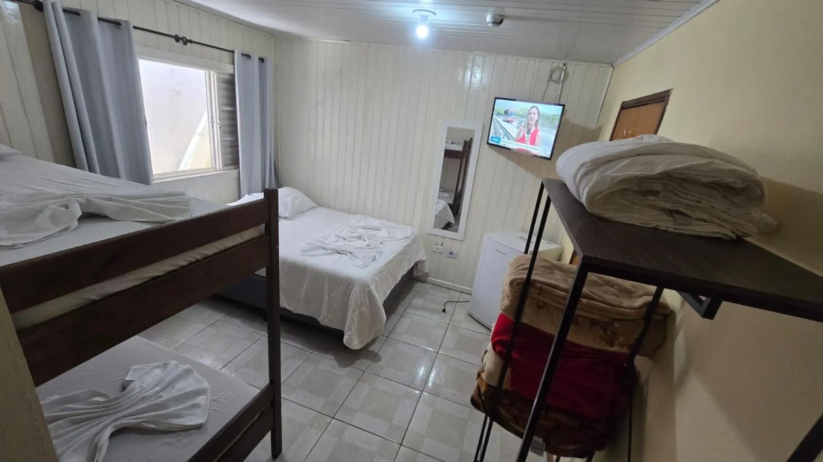 Bed in Pousada Miniférico