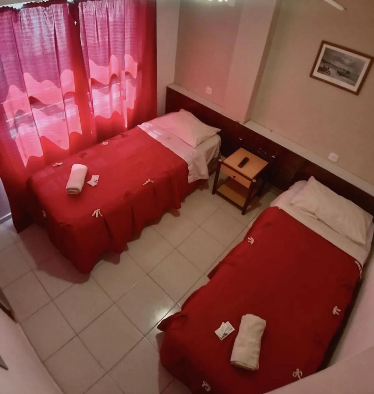 Bed in San Remo Resort Hotel