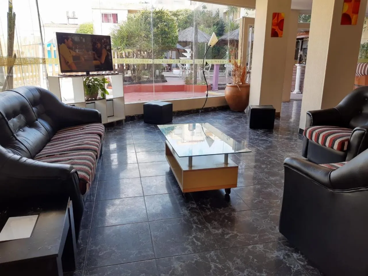 Communal lounge/ TV room in San Remo Resort Hotel