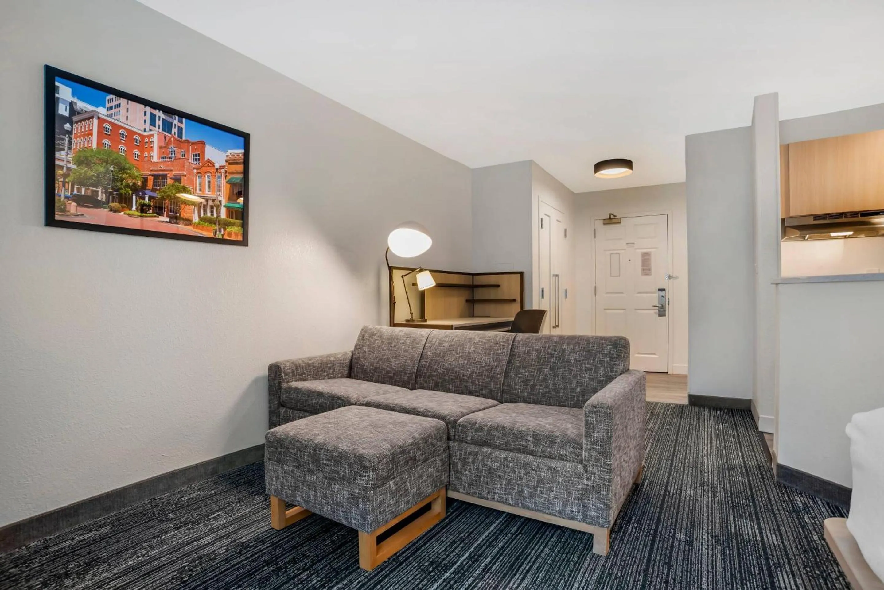 Bedroom in Alluxsuites at 1876, an Ascend Collection Hotel