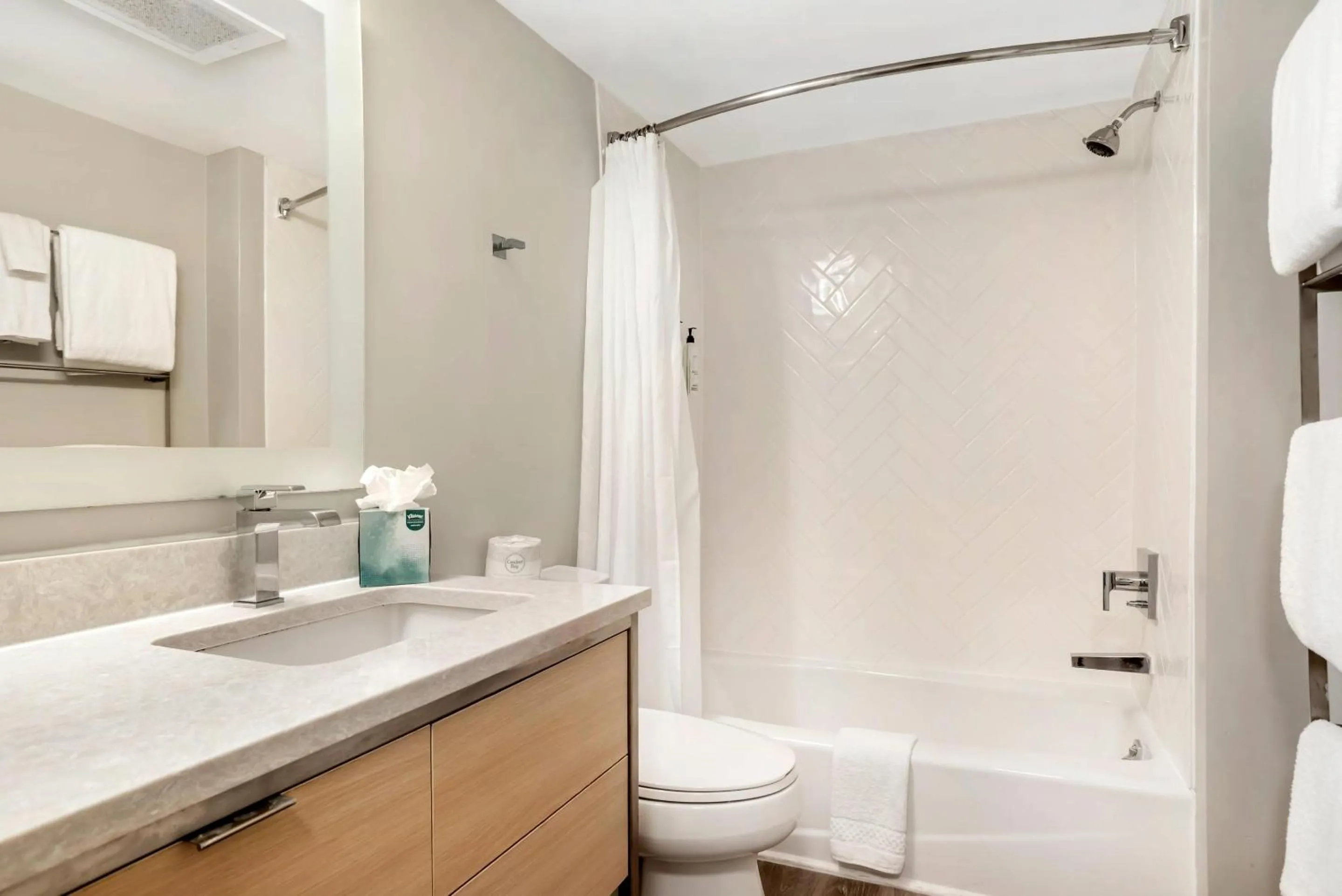 Bedroom in Alluxsuites at 1876, an Ascend Collection Hotel