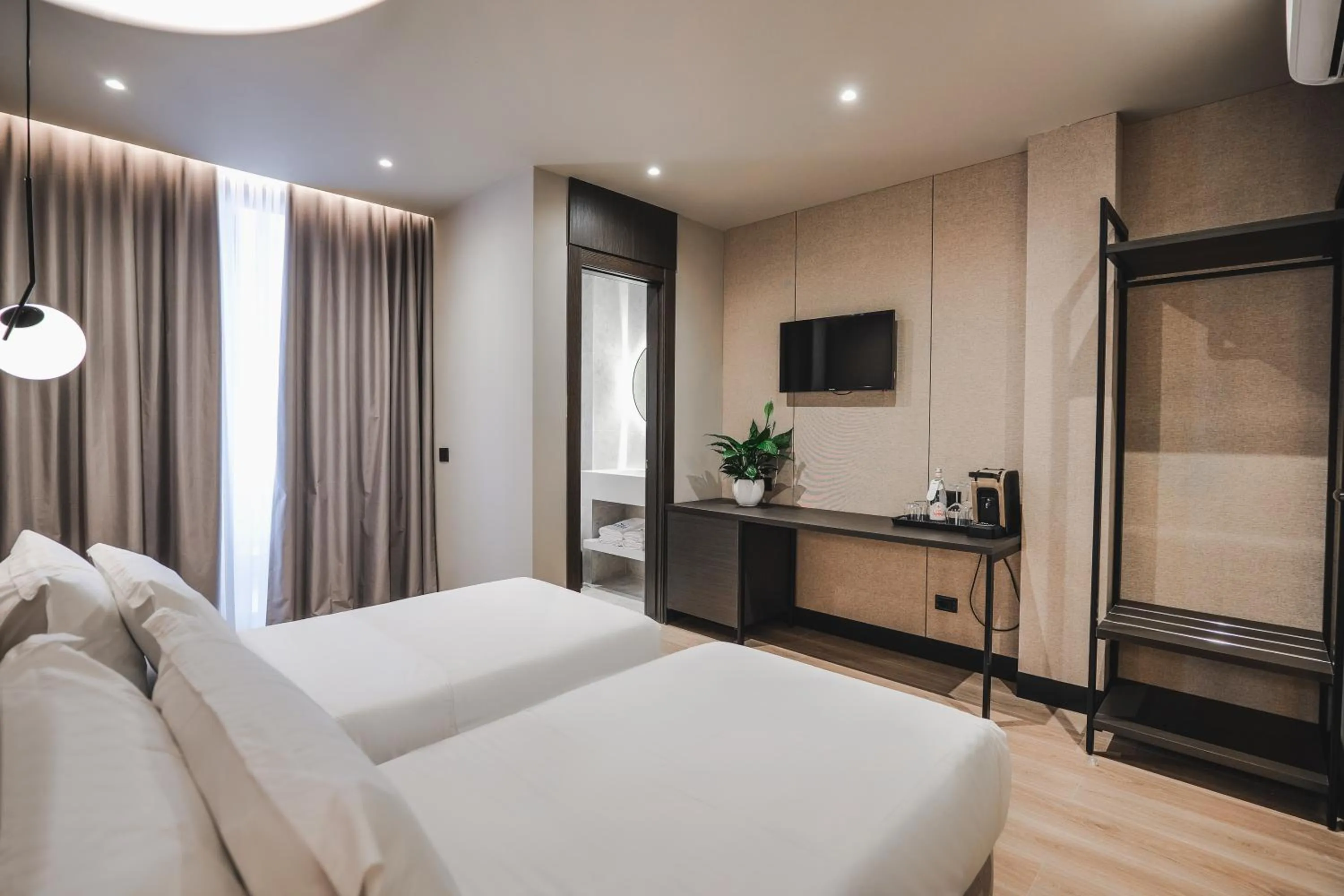 Bed in Miramare Boutique Hotel