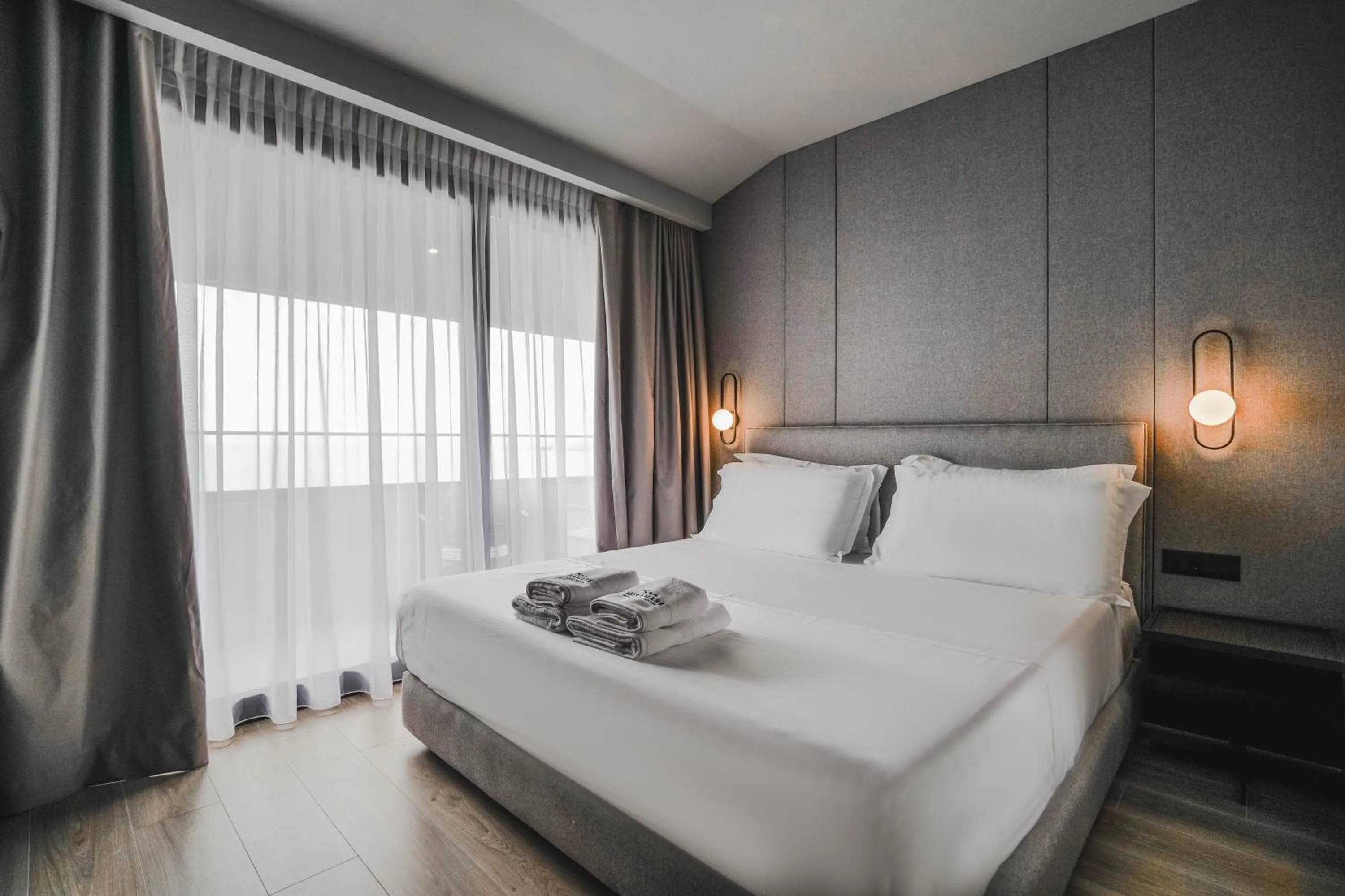 Bed in Miramare Boutique Hotel