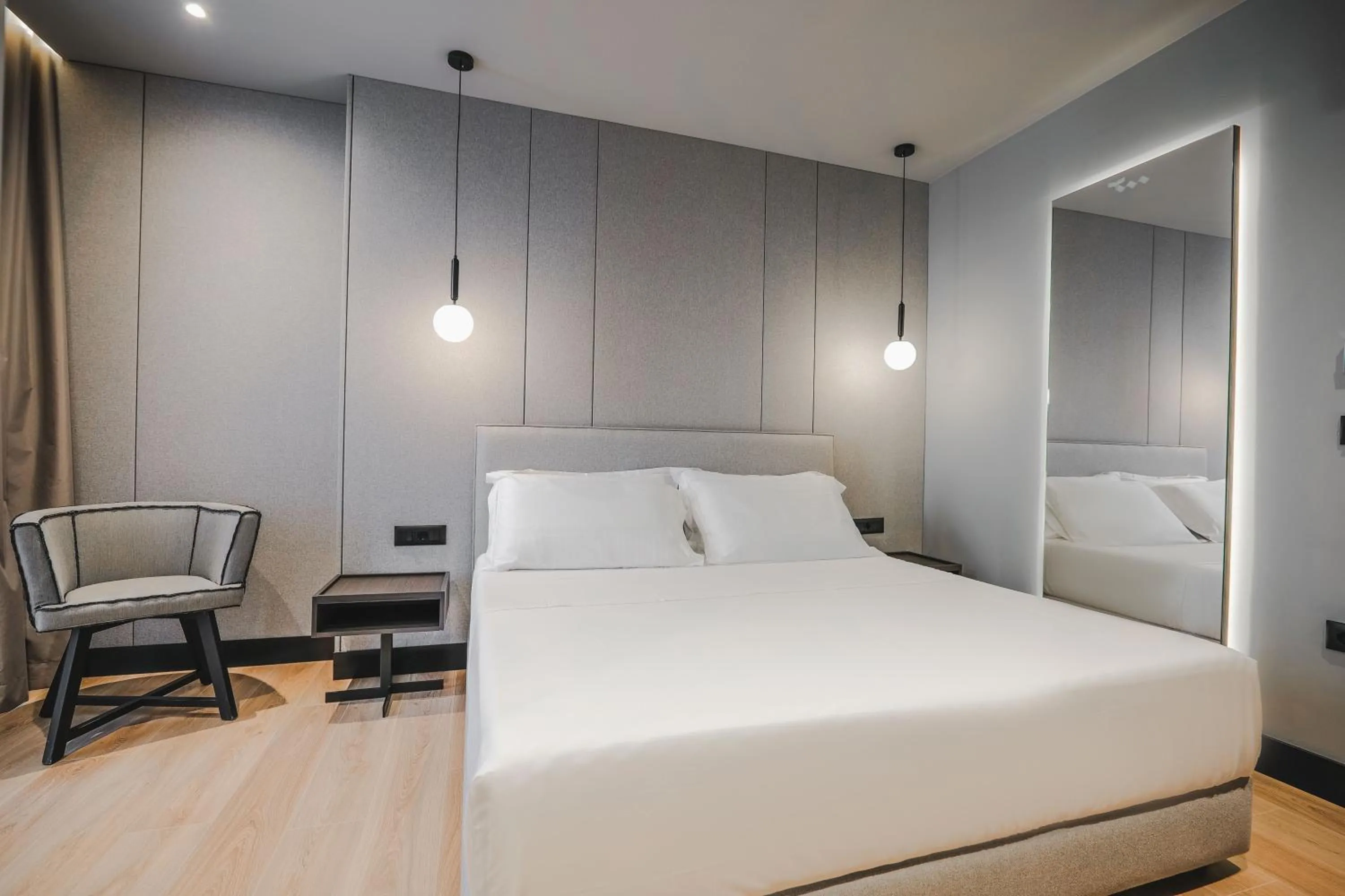 Bed in Miramare Boutique Hotel