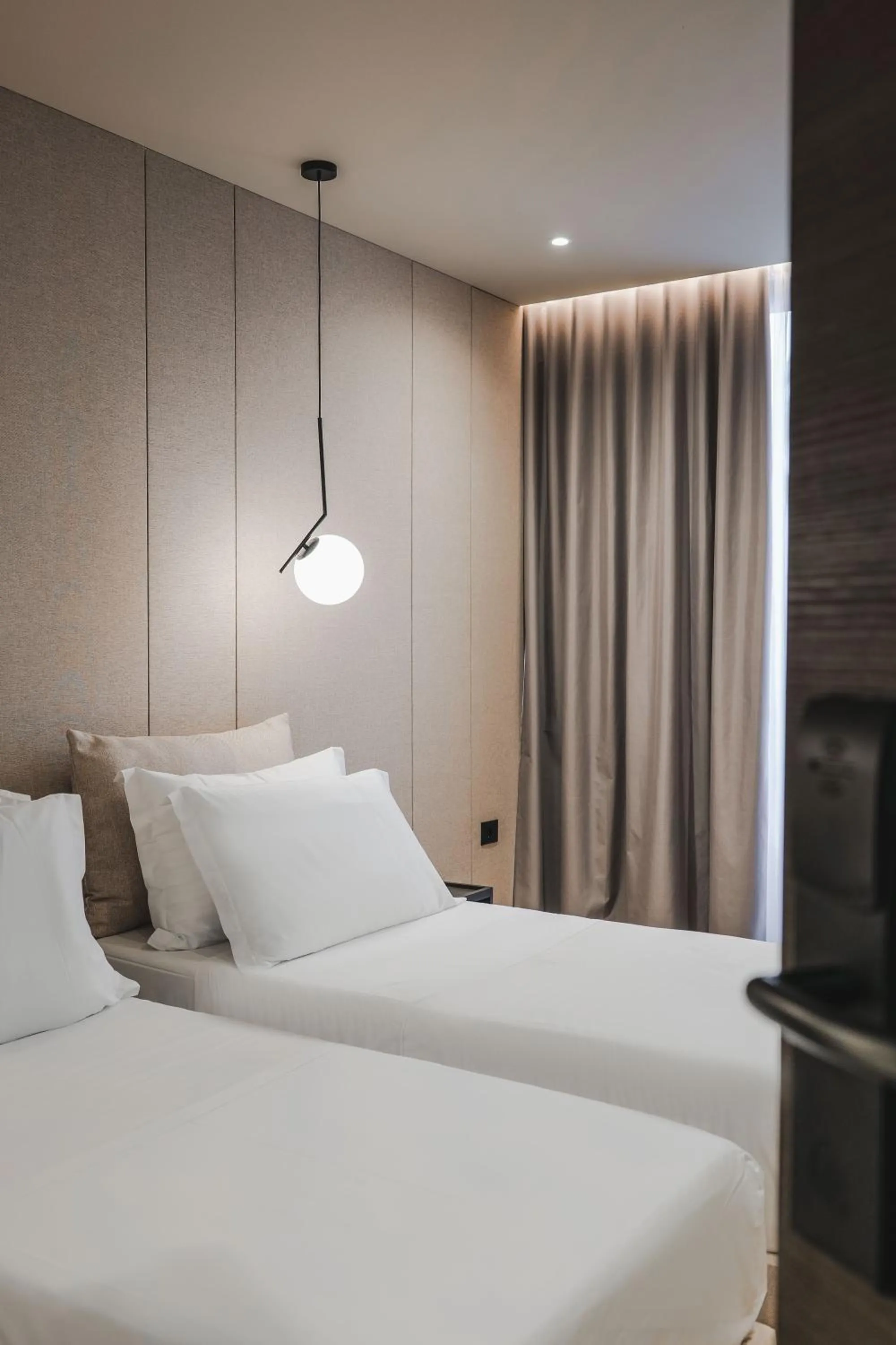 Bed in Miramare Boutique Hotel