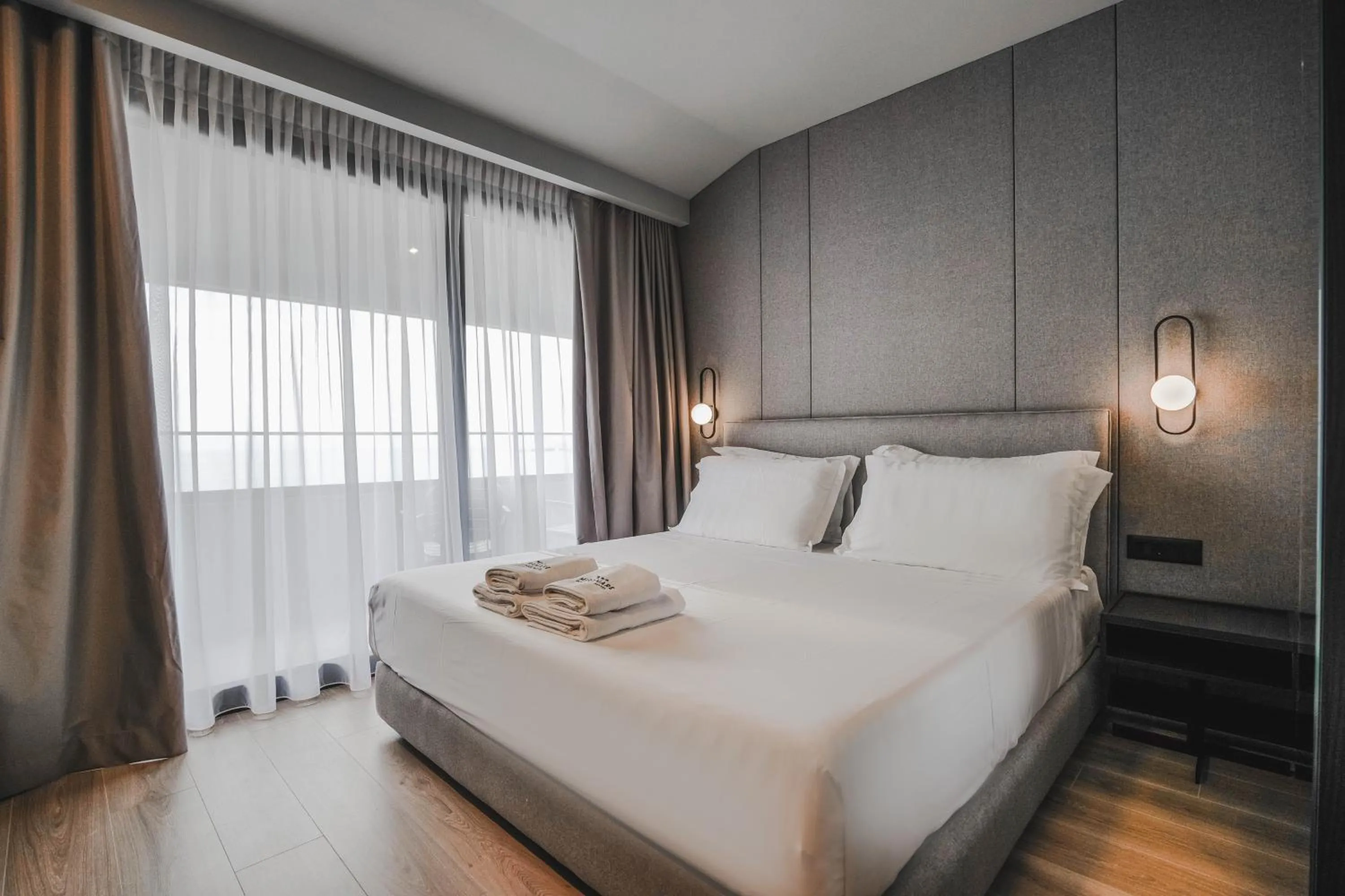 Bed in Miramare Boutique Hotel