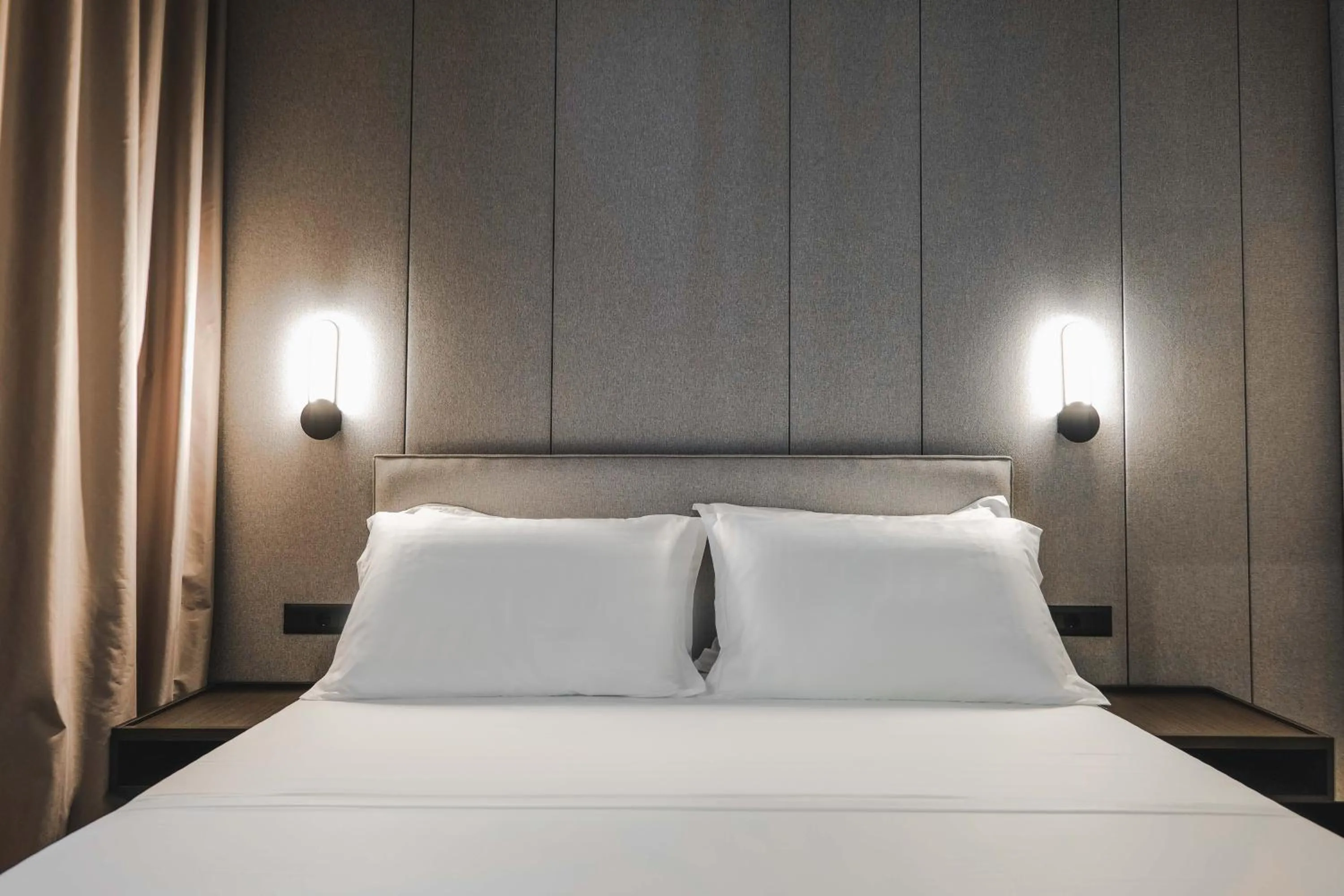 Bed in Miramare Boutique Hotel