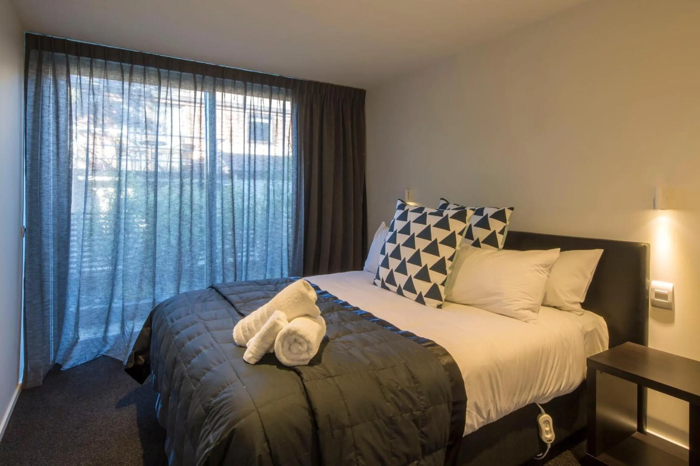 Bedroom, Bed in Central Queenstown Apartment 15 Melbourne