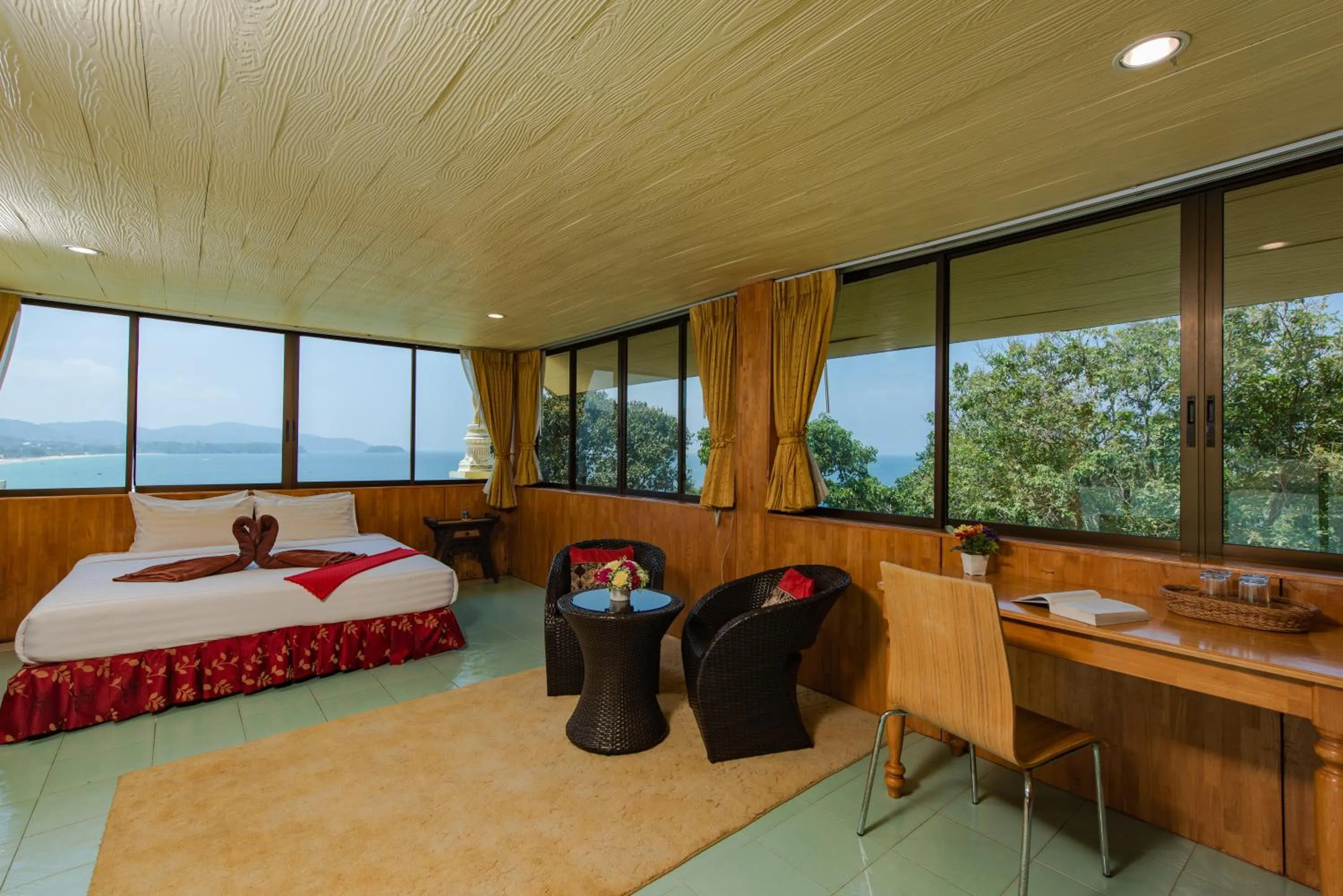 Bed in Baan Karon Hill Phuket Resort